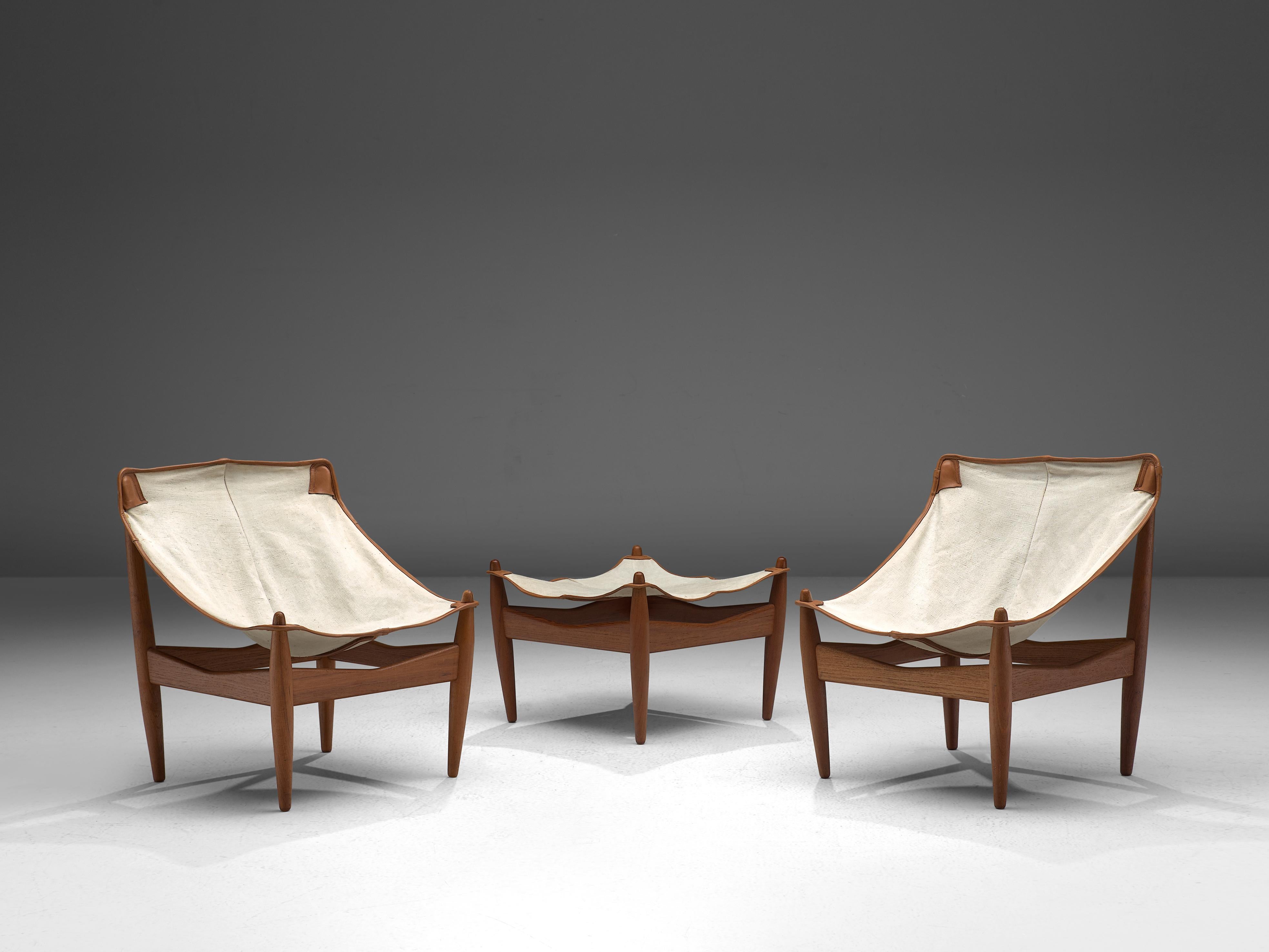 Illum Wikkelsø for C.F. Christiansen, pair of easy chairs and ottoman model 272, teak, off-white canvas, leather, Denmark, 1963

Very rare easy chairs and ottoman by Danish designer Illum Wikkelsø in teak and canvas. The solid teak legs are tapered