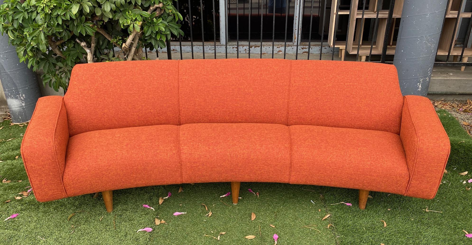 A stunning midcentury Danish modern sofa designed by Illum Wikkelso, Denmark, circa 1960s. Professionally restored in a period appropriate tweed.