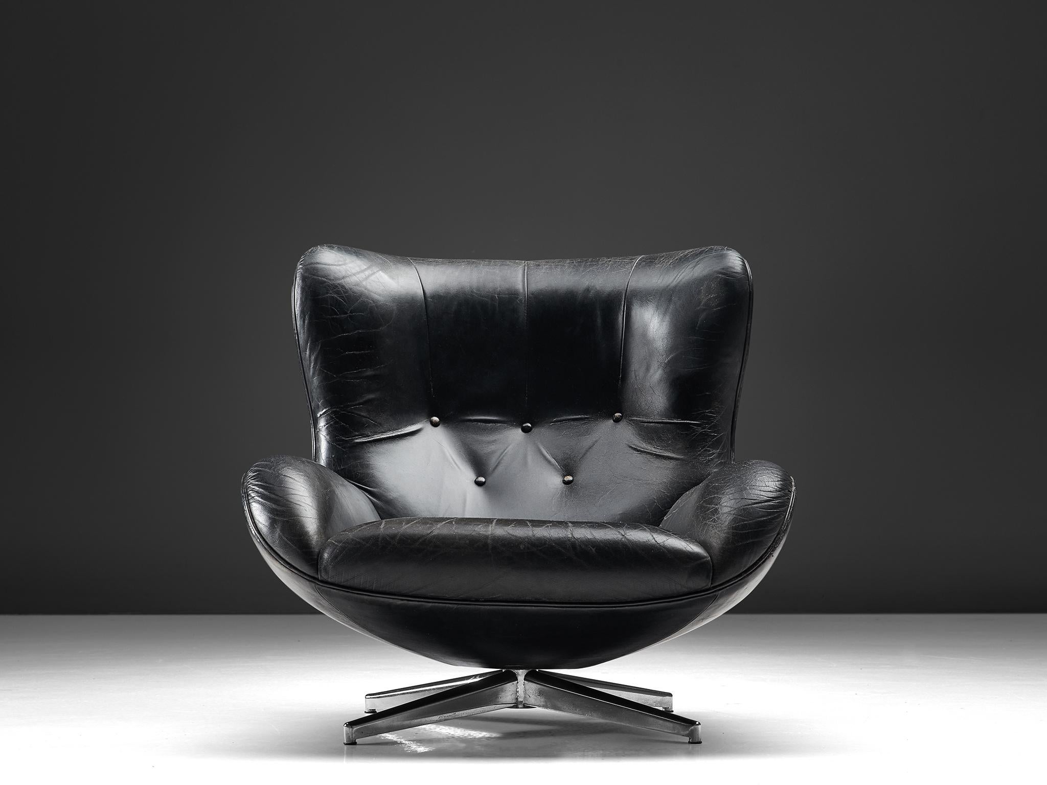 Danish Illum Wikkelsø Swivel Leather Lounge Chair with Ottoman, 1960s