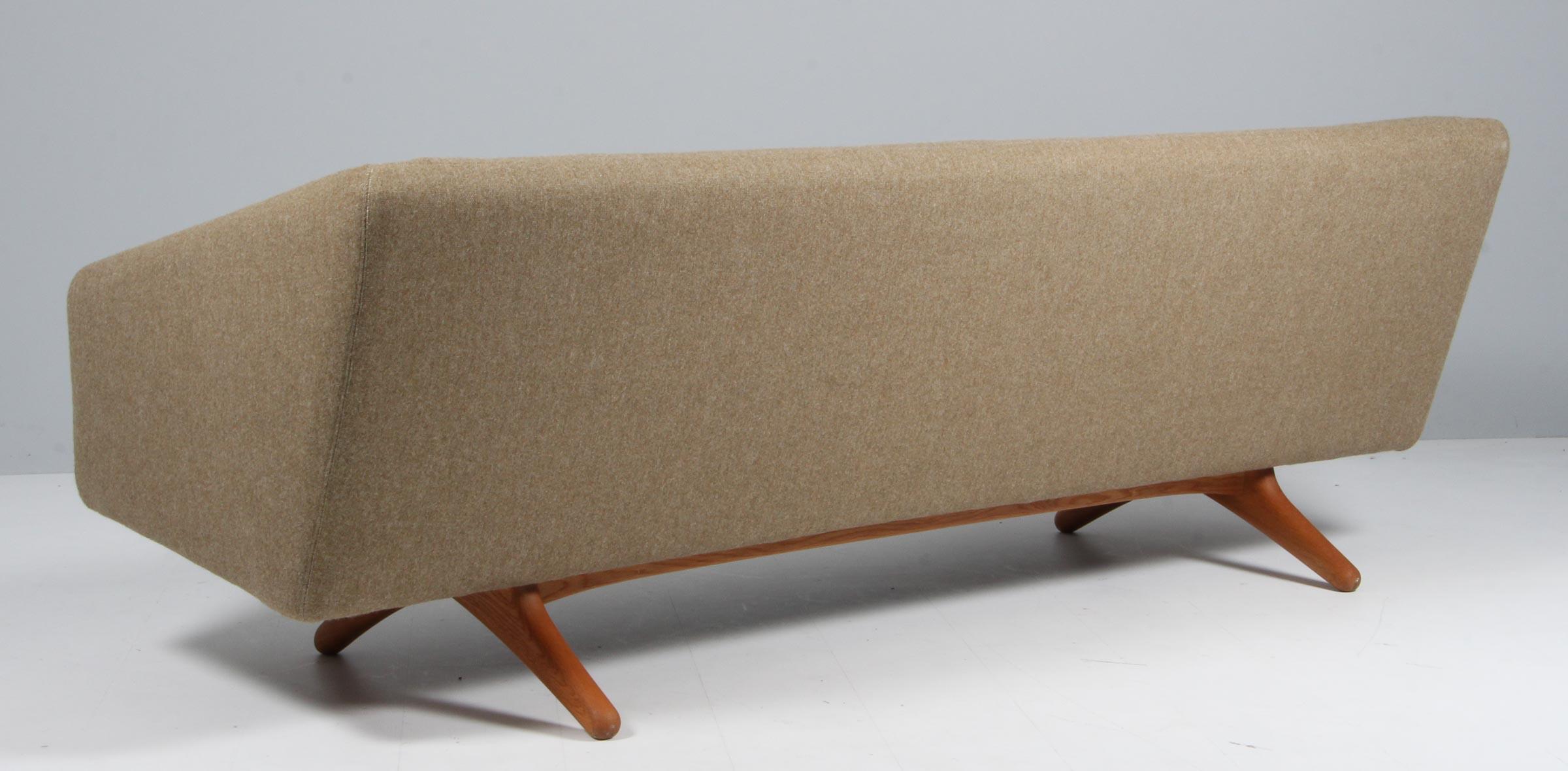 Illum Wikkelsø three-seat original upholstered with hallingdal wool from Kvadrat.

Legs in oak.

Model ML 90, made by Mikael Laursen, Denmark, 1960s.