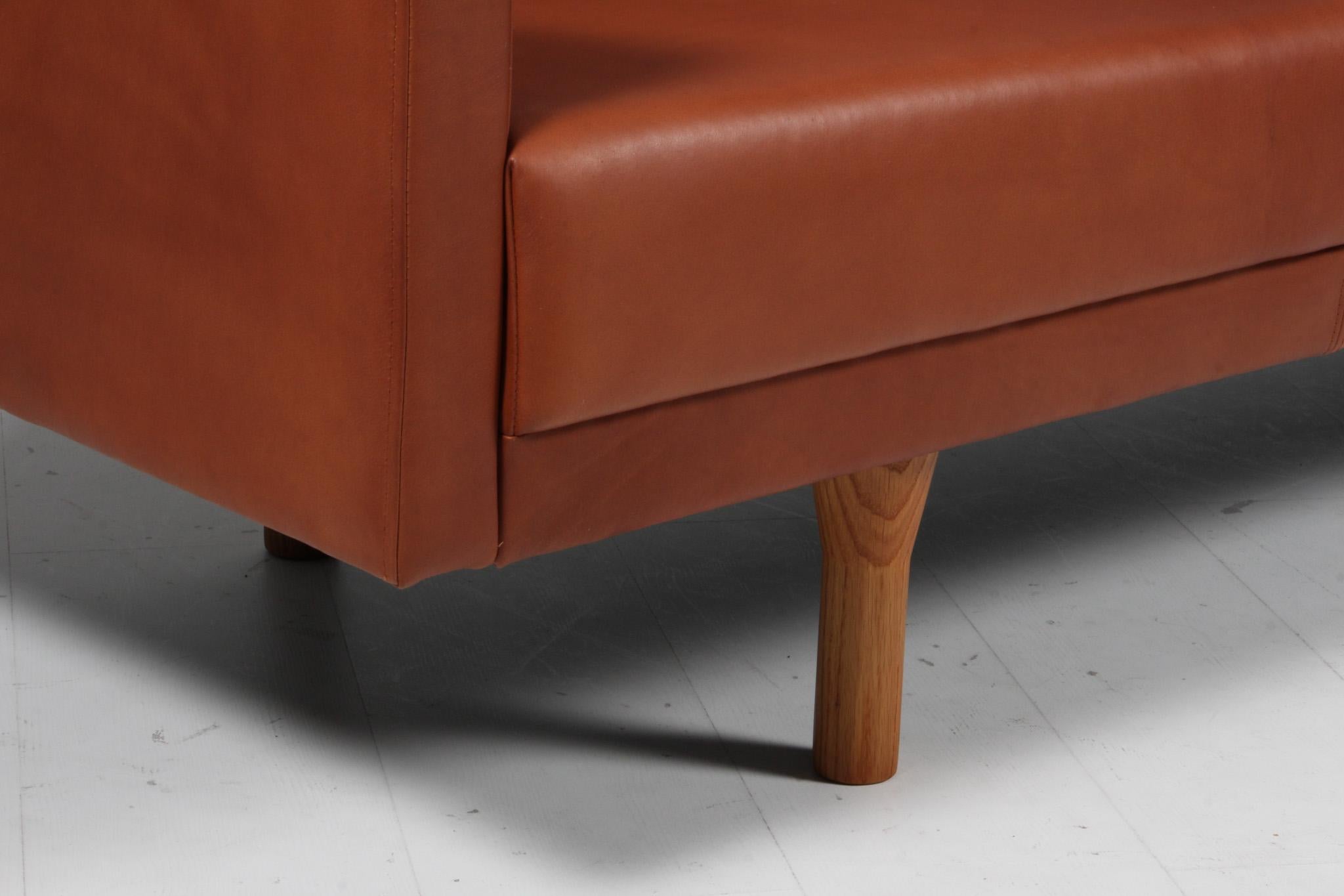 Danish Illum Wikkelsø three seat sofa, new upholstered For Sale