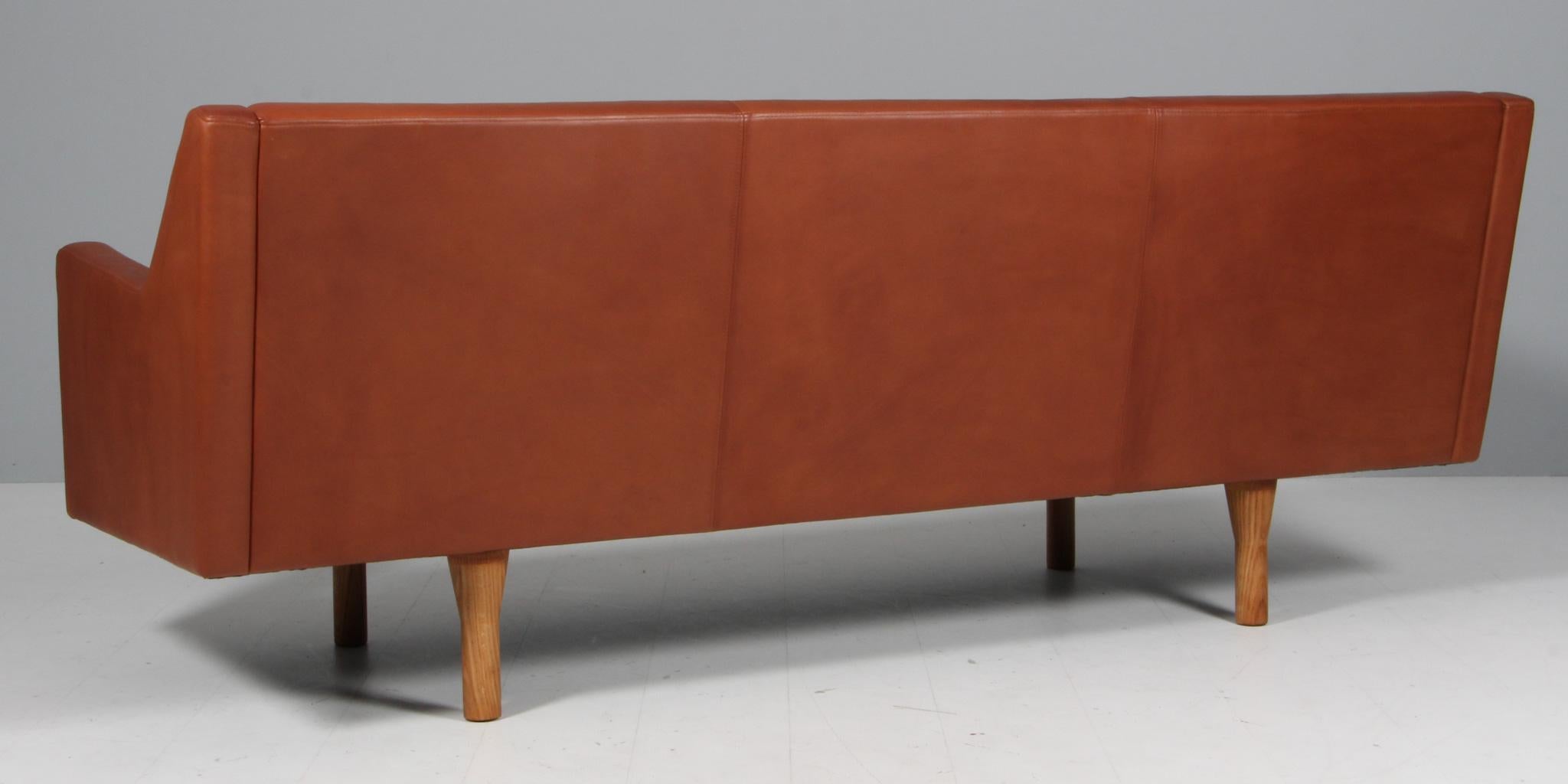 Leather Illum Wikkelsø three seat sofa, new upholstered For Sale