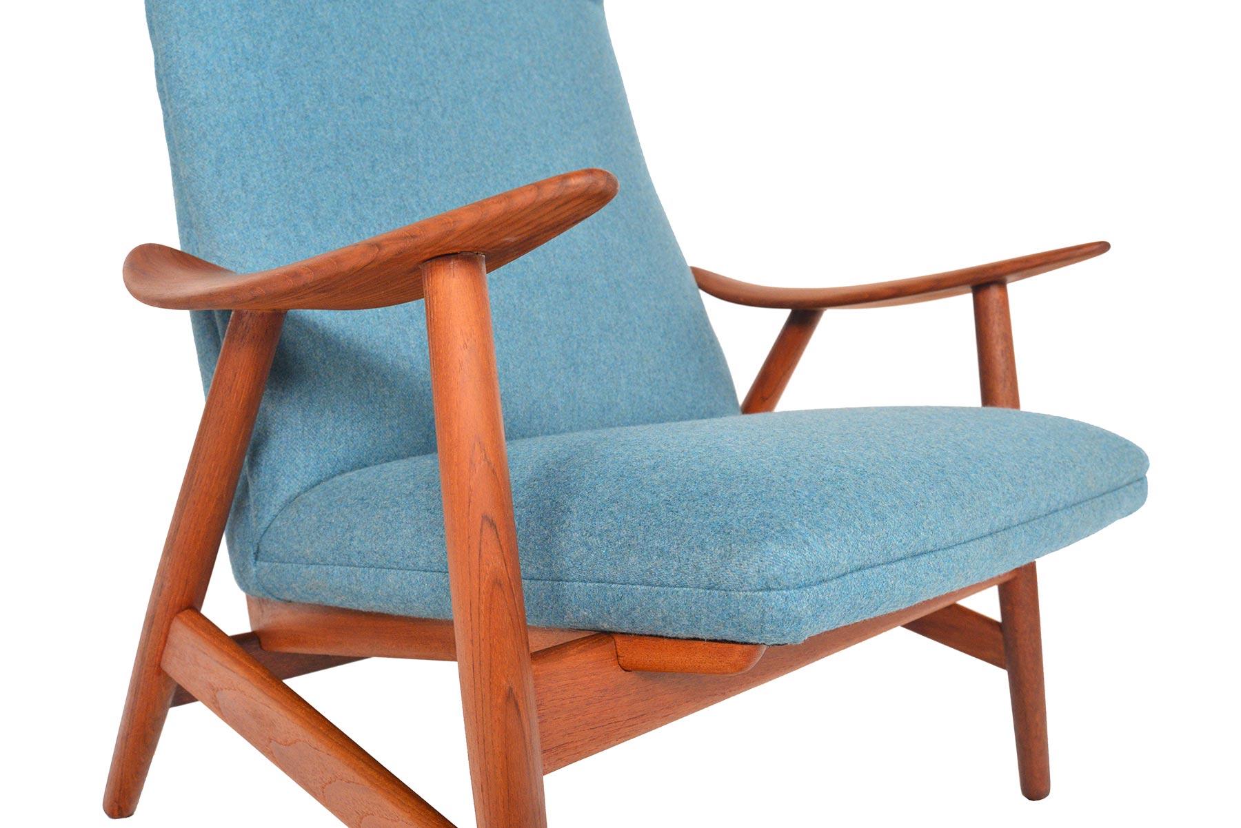 Designed in the late 1950s as Model 10H, this stunning lounge chair by Illum Wikkelso for Søren Willadsen features beautifully sculpted teak arms. Boomerang shaped brackets support this highback design and creates an interesting silhouette from