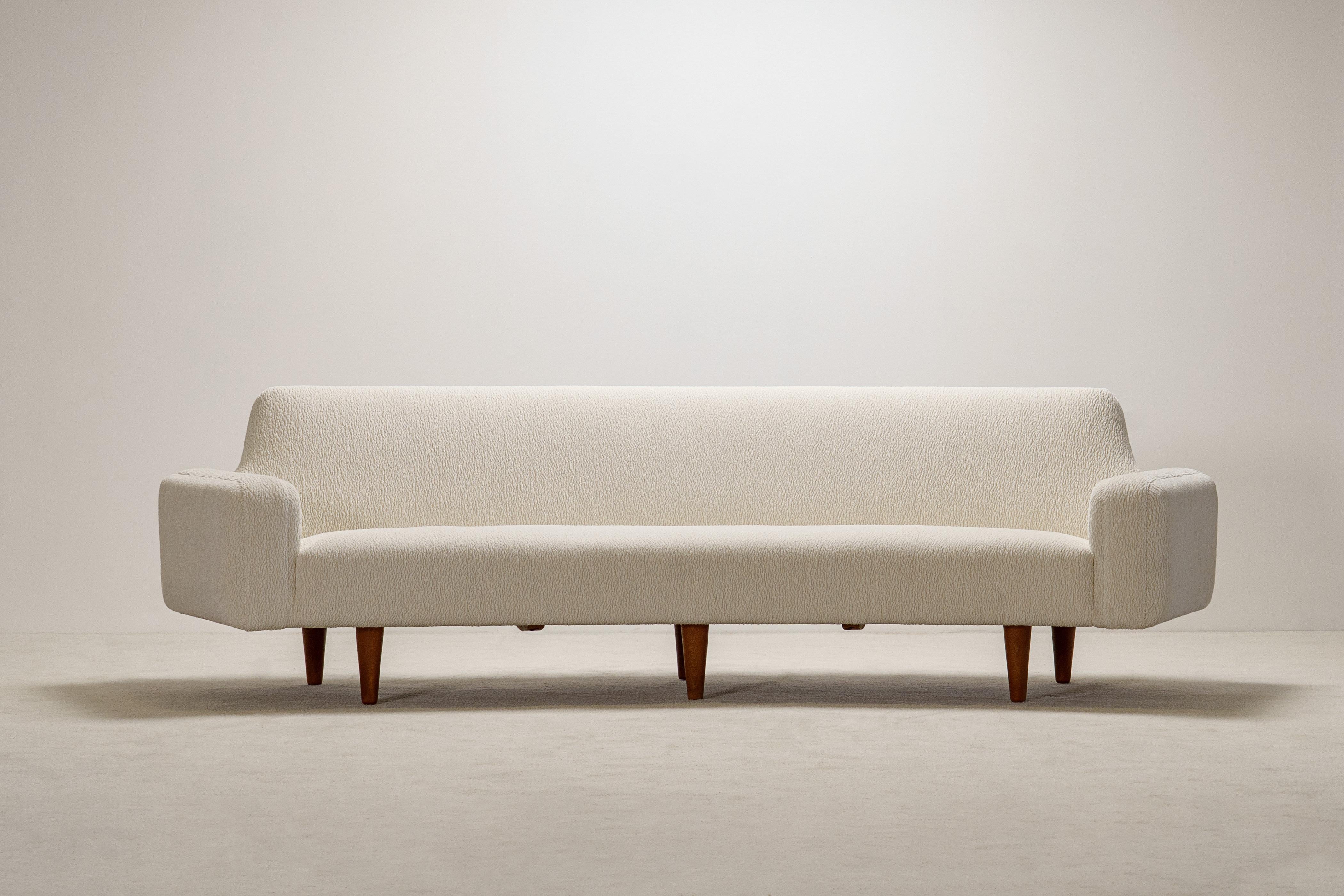 Elegant and rare curved sofa 