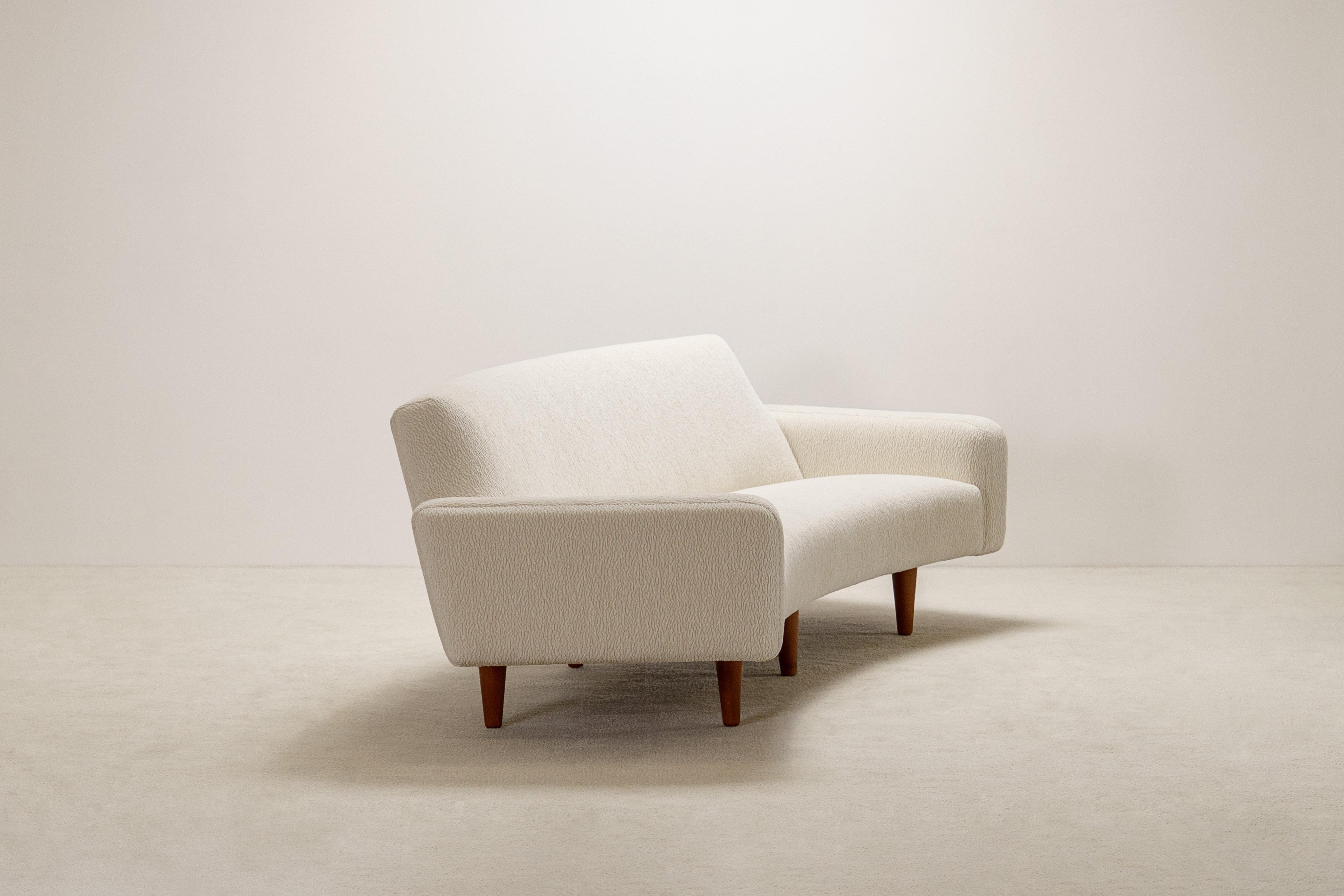 Danish Illum Wikkelso 3 Seat Curved Sofa Model 450. Circa 1960. New upholstery. For Sale
