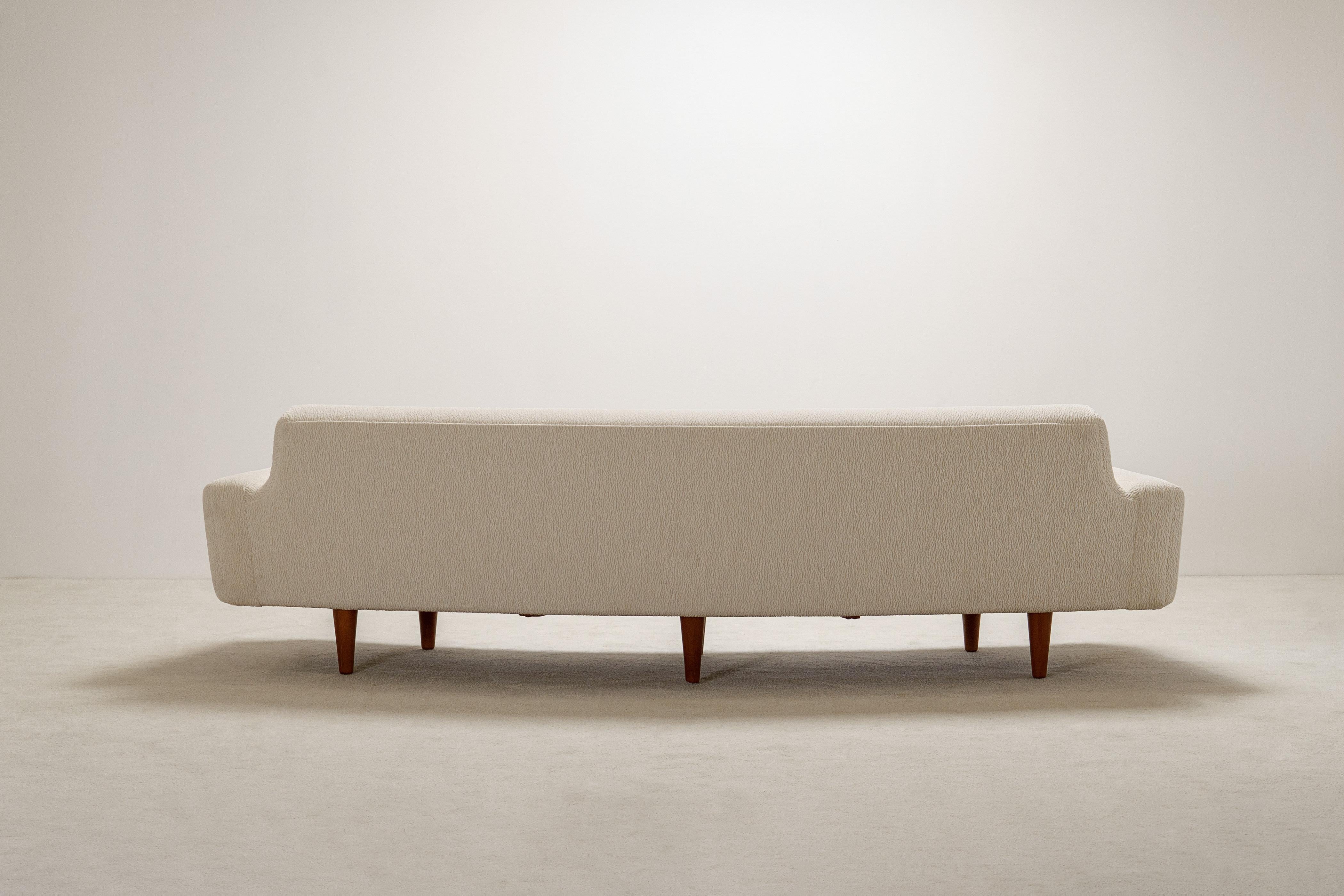 Fabric Illum Wikkelso 3 Seat Curved Sofa Model 450. Circa 1960. New upholstery. For Sale
