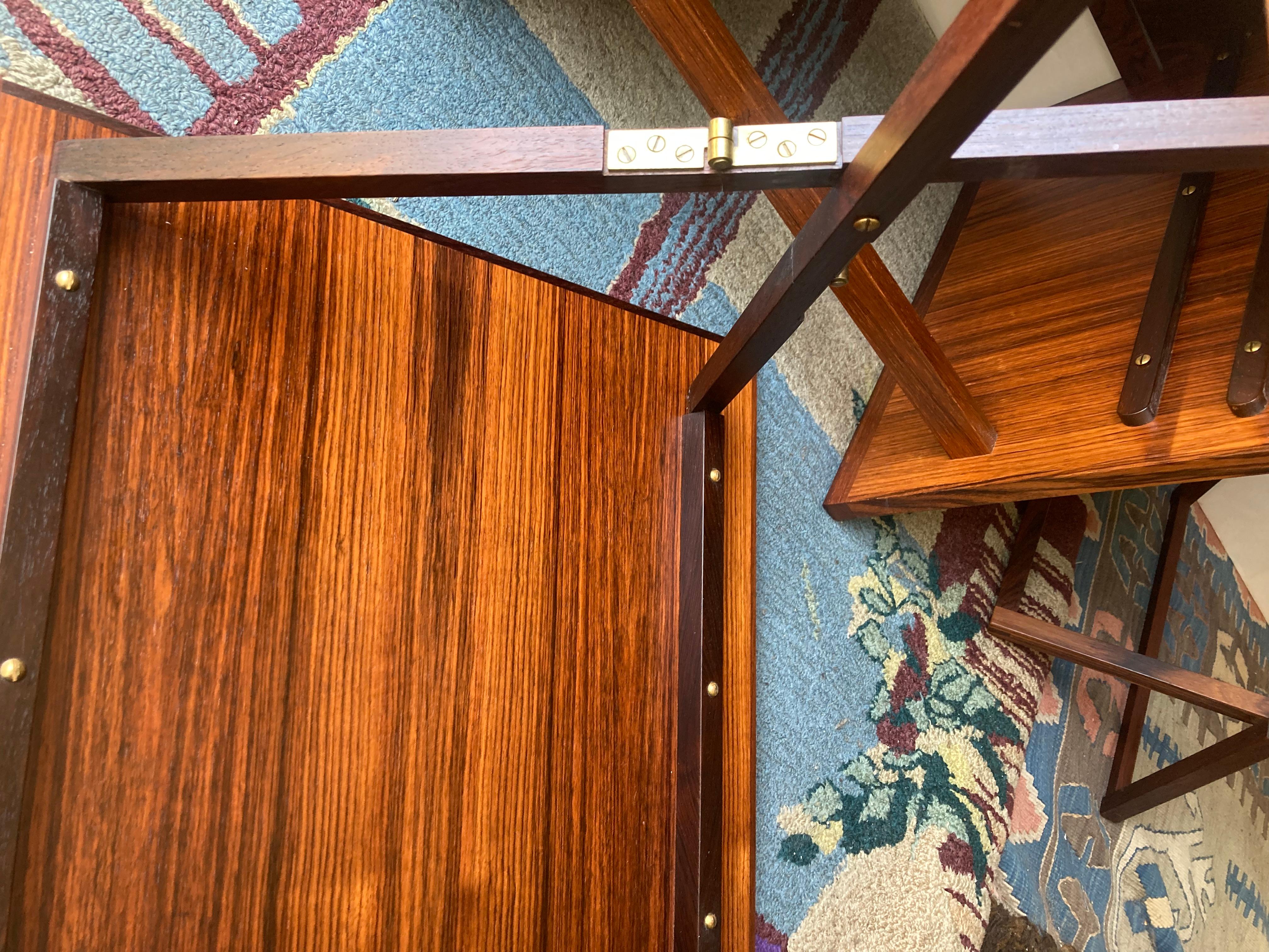 Late 20th Century Illum Wikkelso attb rosewood nesting folding campaign tables Denmark . For Sale