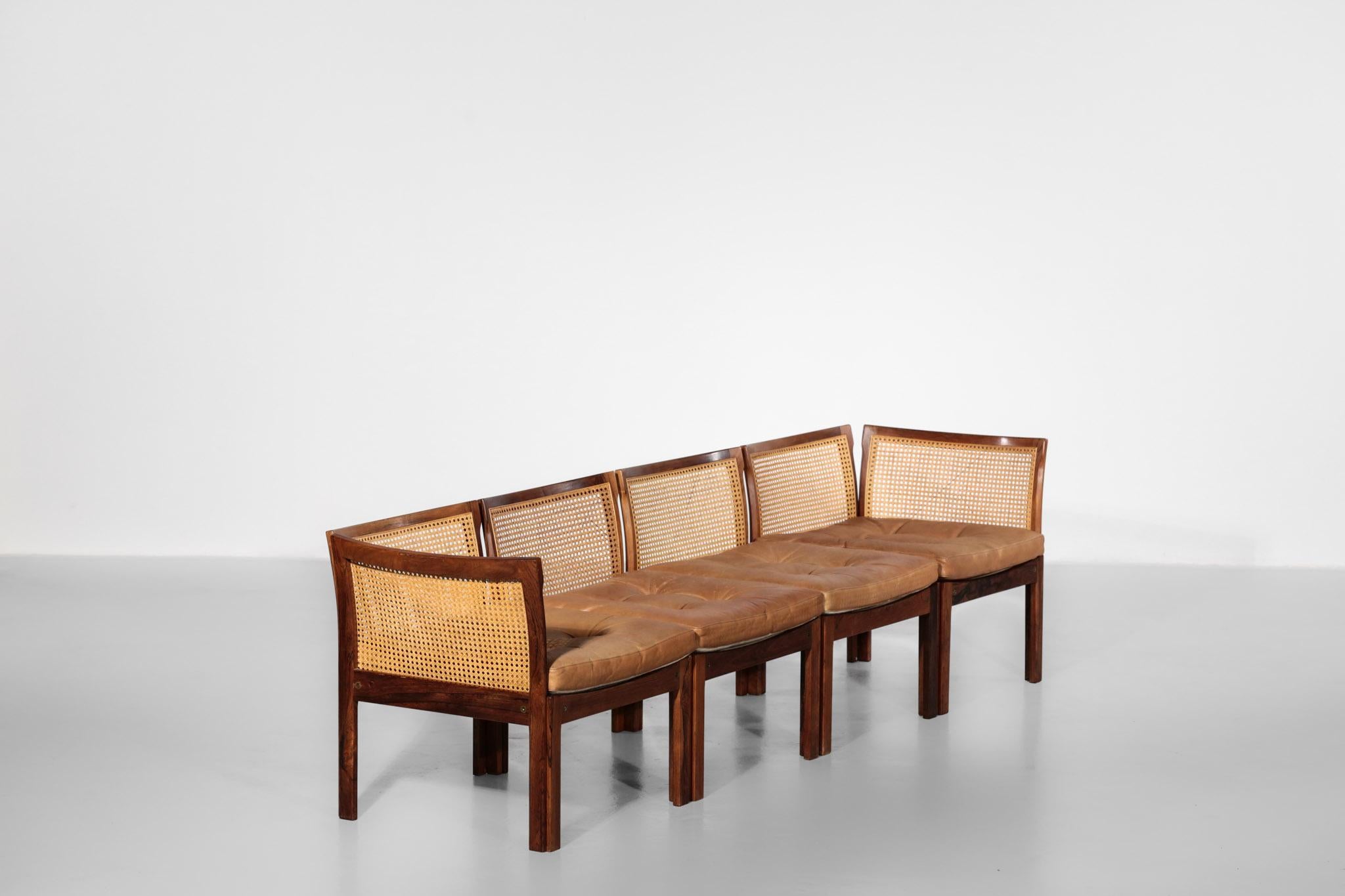 Rare bench by Danish designer Illum Wikkelso

Rosewood and wicker structure, fawn leather cushion with a beautiful patina.
  
