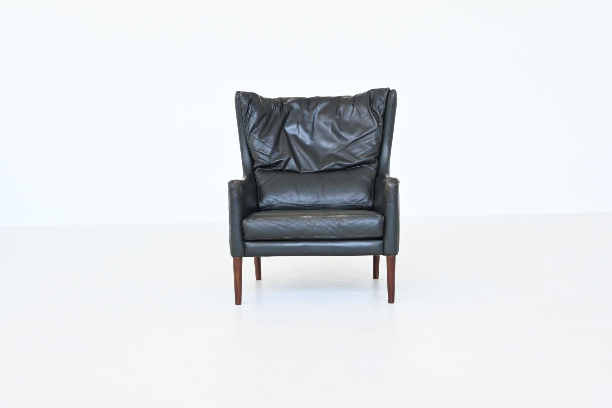 Illum Wikkelso lounge chair and foot stool in leather Denmark 1960 For Sale 4
