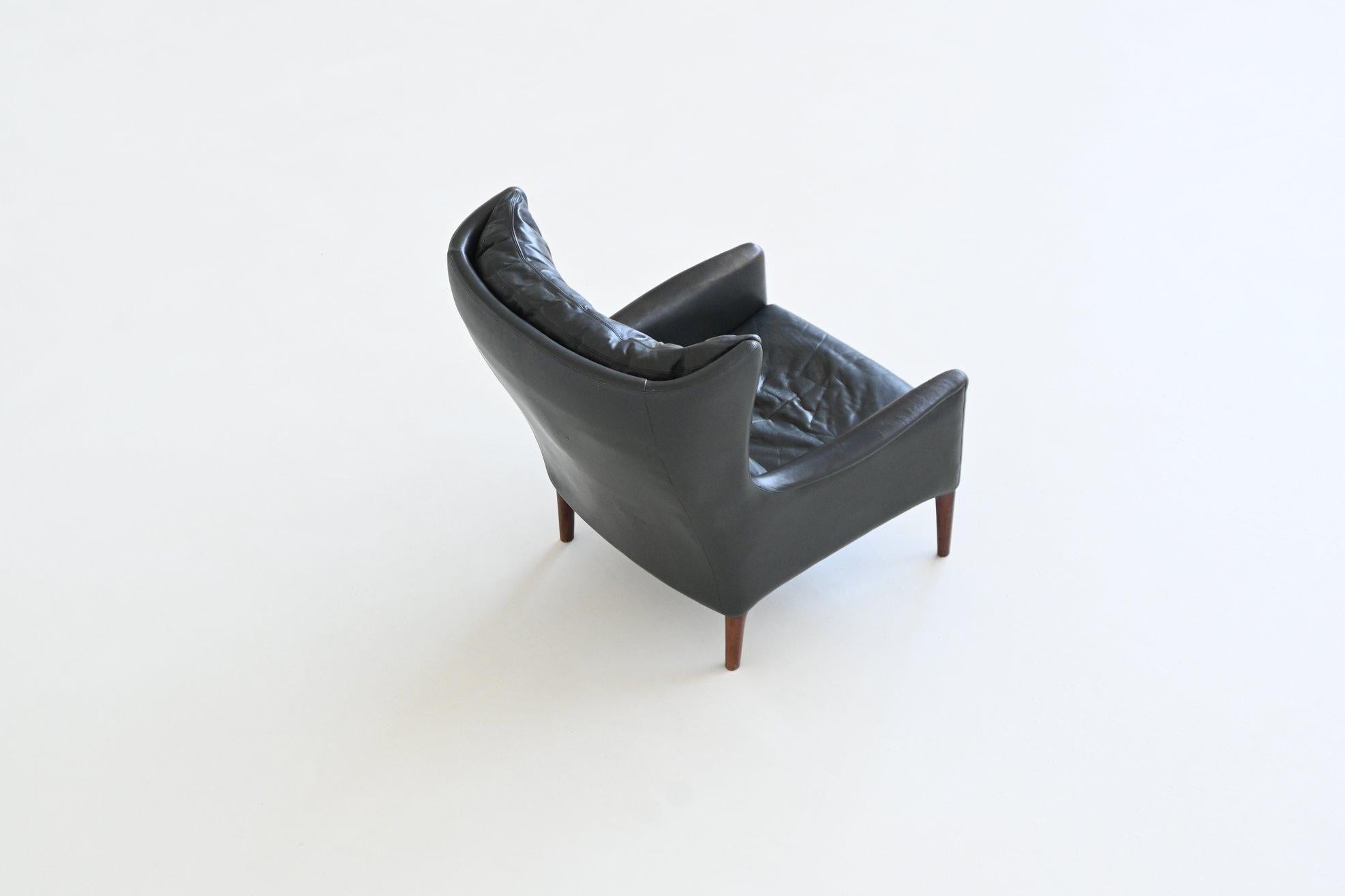 Illum Wikkelso lounge chair and foot stool in leather Denmark 1960 For Sale 7