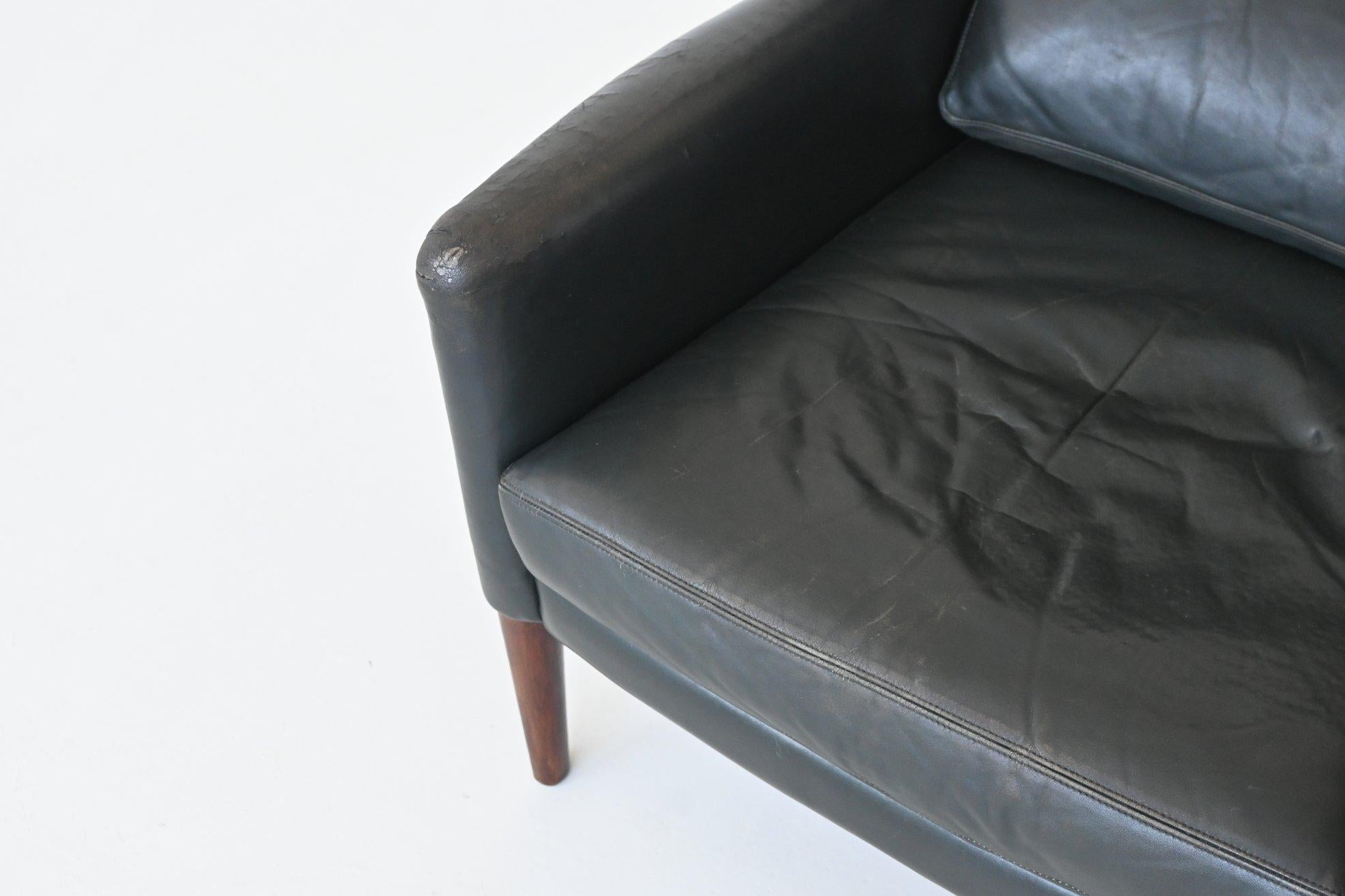 Illum Wikkelso lounge chair and foot stool in leather Denmark 1960 For Sale 11
