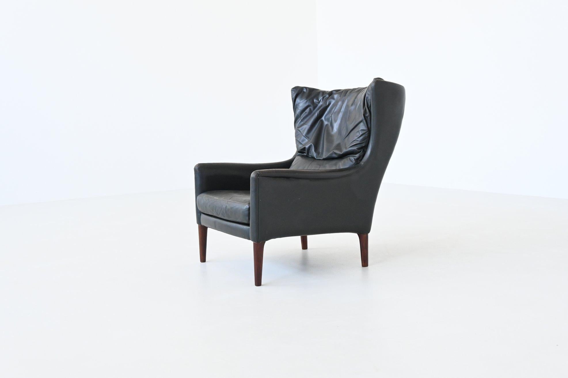 Illum Wikkelso lounge chair and foot stool in leather Denmark 1960 For Sale 3