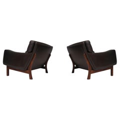 Illum Wikkelso Mid-century Scandinavian Leather and Rosewood Lounge Chairs
