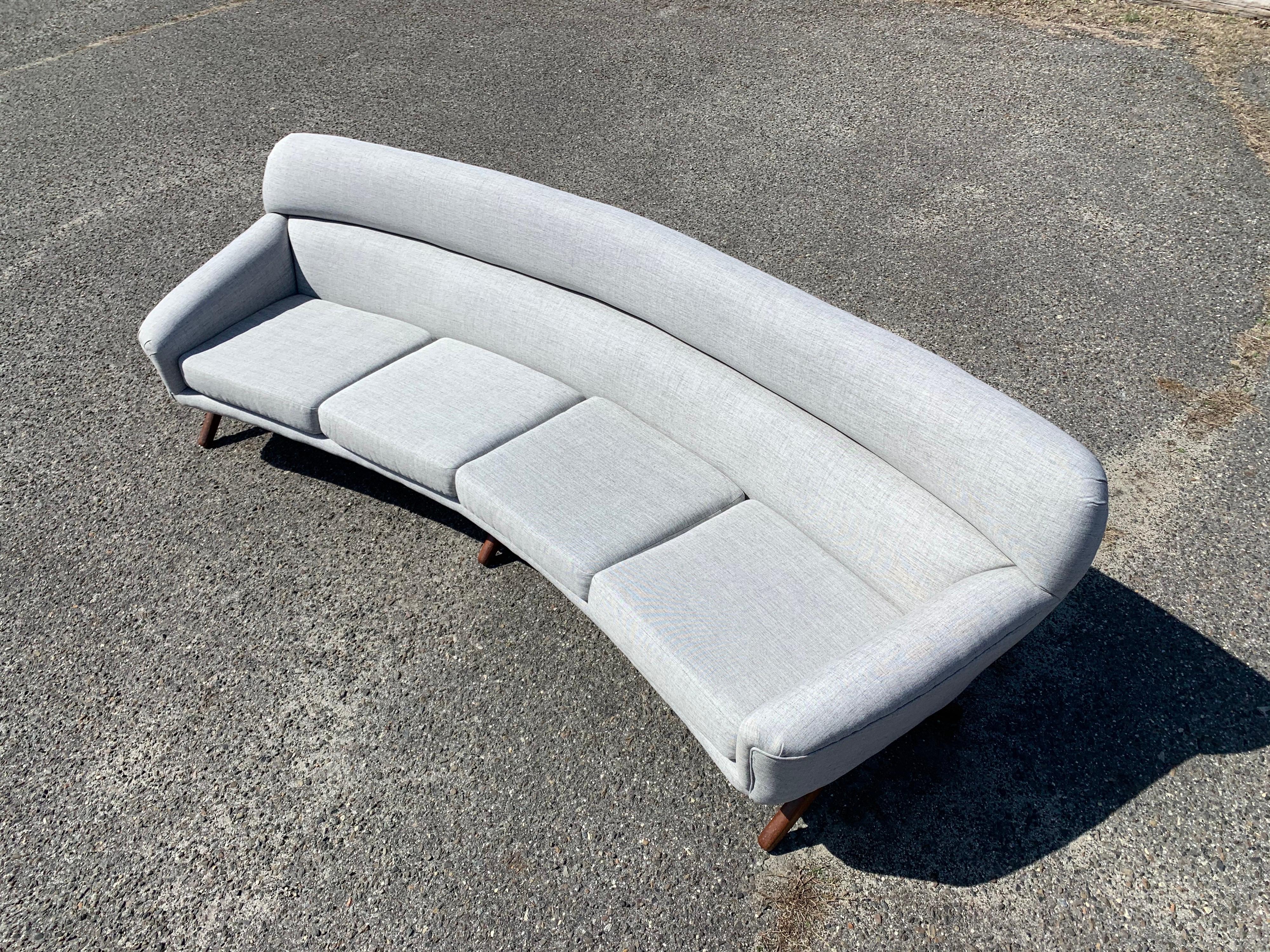 Illum Wikkelsø-Mikael Laursen 105” 4-seat sofa having 3 sets of teak legs.
Masterfully reupholstered as needed.
Outstanding overall condition.
Original receipt and letter of ownership are included.
