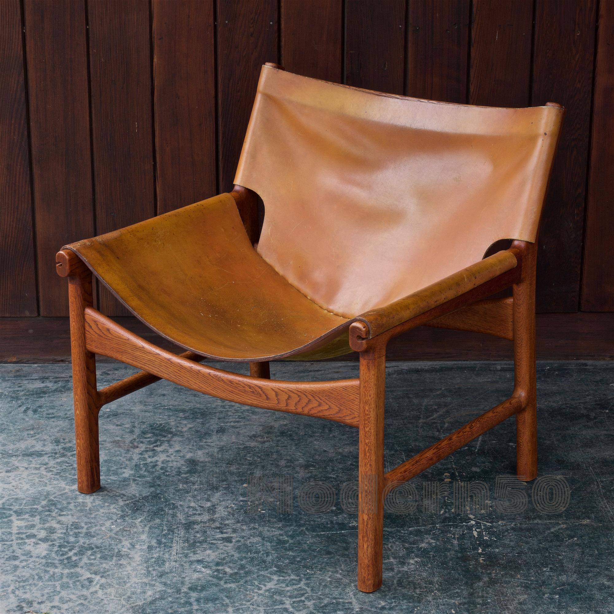 leather sling armchair