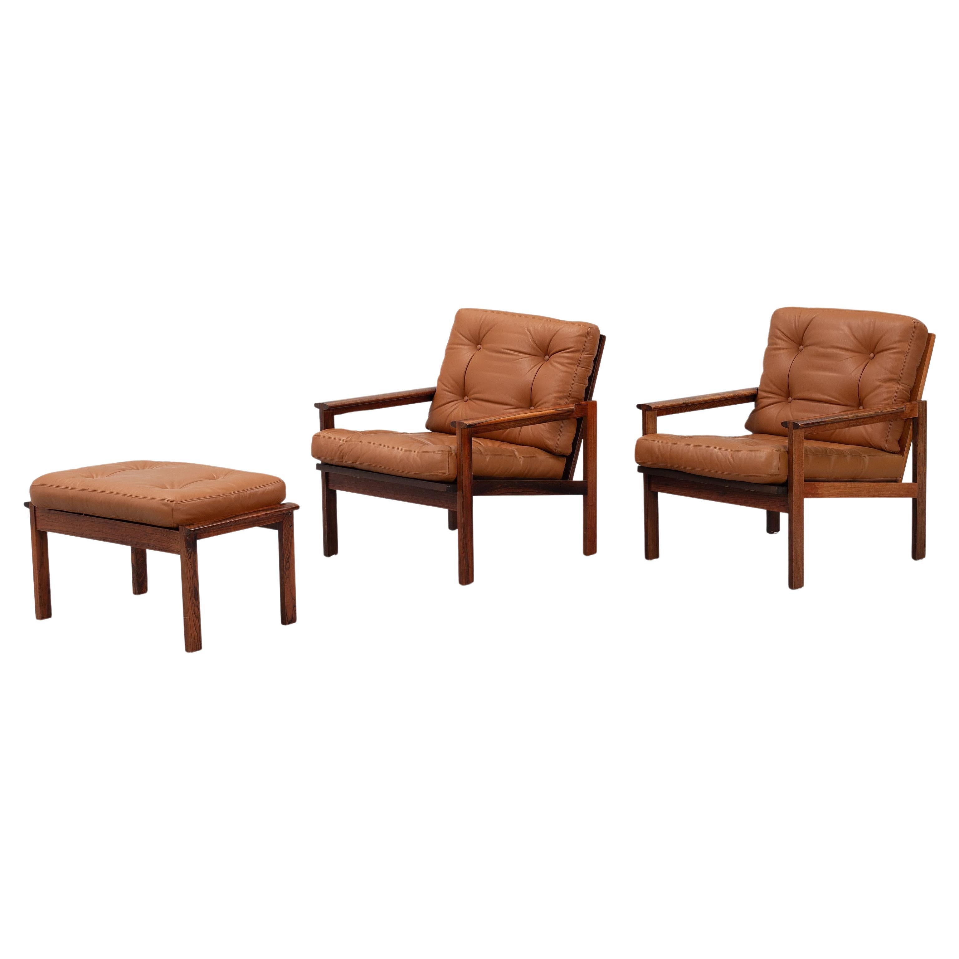 Illum Wikkelso pair of 'Capella'  armchairs with pouf Denmark 1960 For Sale