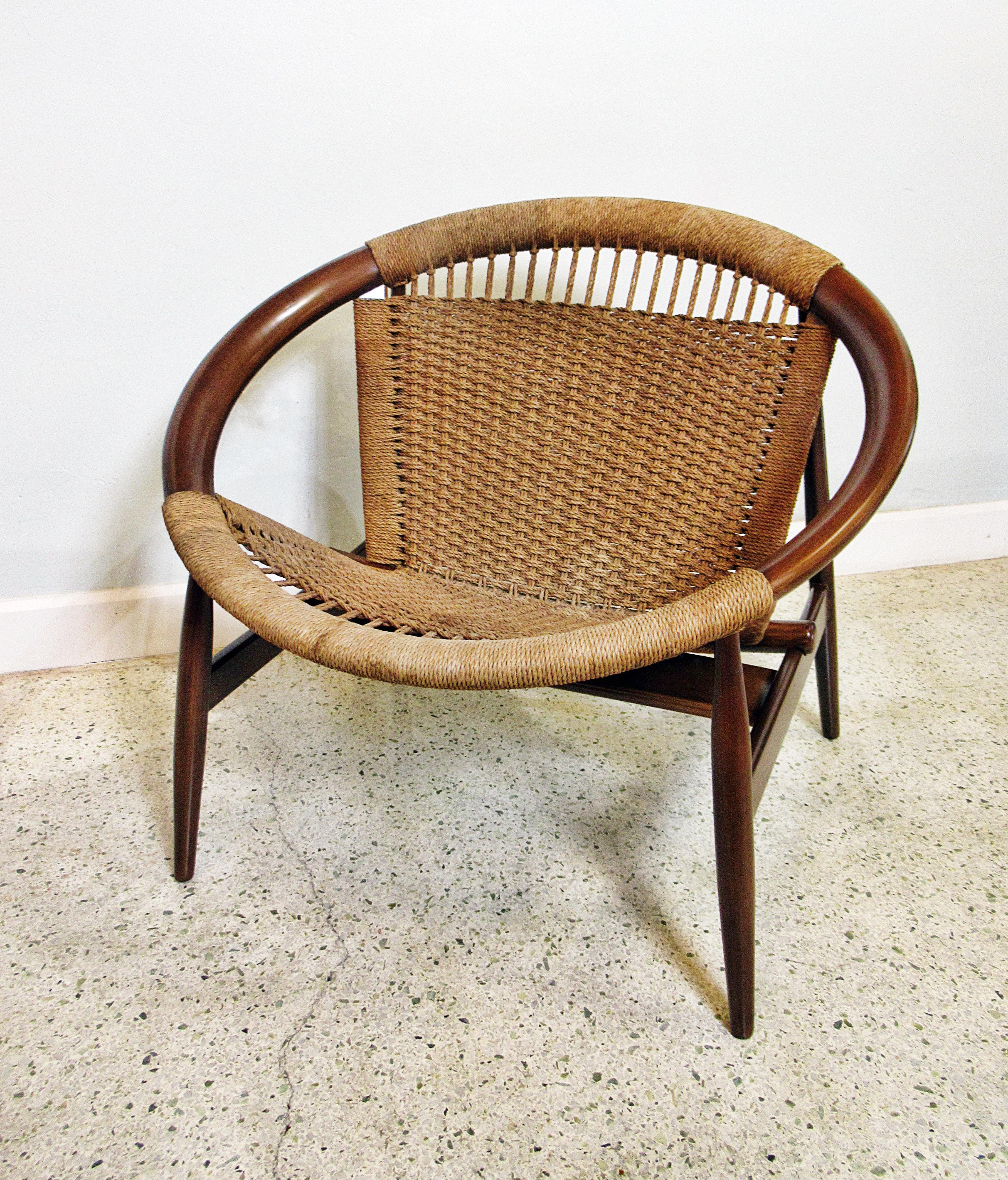 The Ringstol chair was produced in Denmark by N. Eilersen beginning in the mid-1950s. This chair is teak and woven cord, stamped with “Made in Denmark”. Fully restored.
 