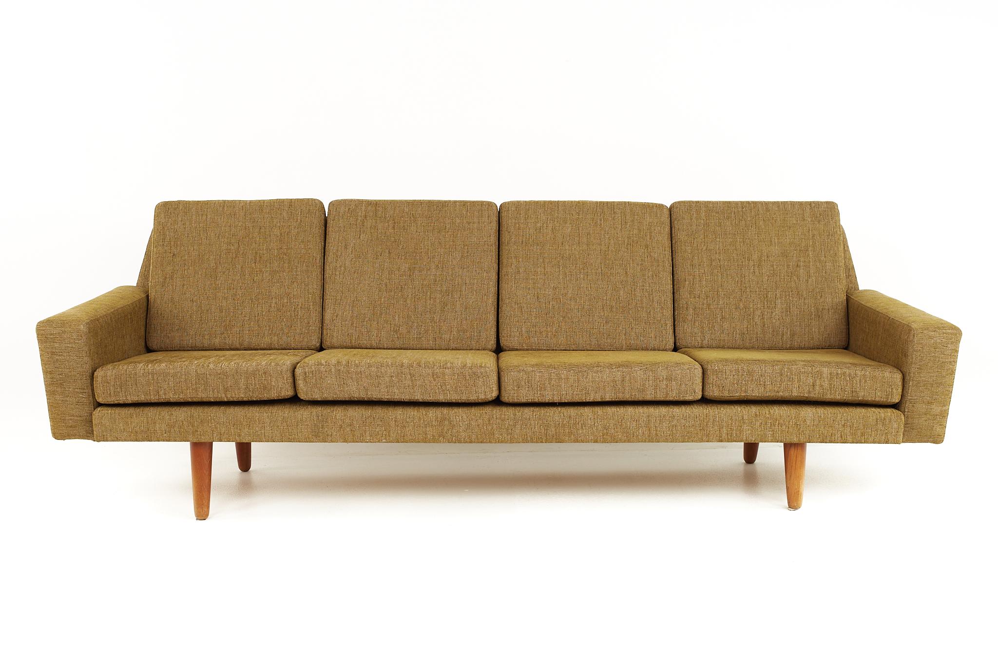 Illum Wikkelso style mid-century danish teak sofa

This sofa measures: 90 wide x 27 deep x 32 inches high, with a seat height of 16 and arm height of 21 inches

All pieces of furniture can be had in what we call restored vintage condition. That