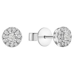 Boucles d'oreilles rondes enluminées 1/8 carat TW de Rupali Adani Fine Jewellery