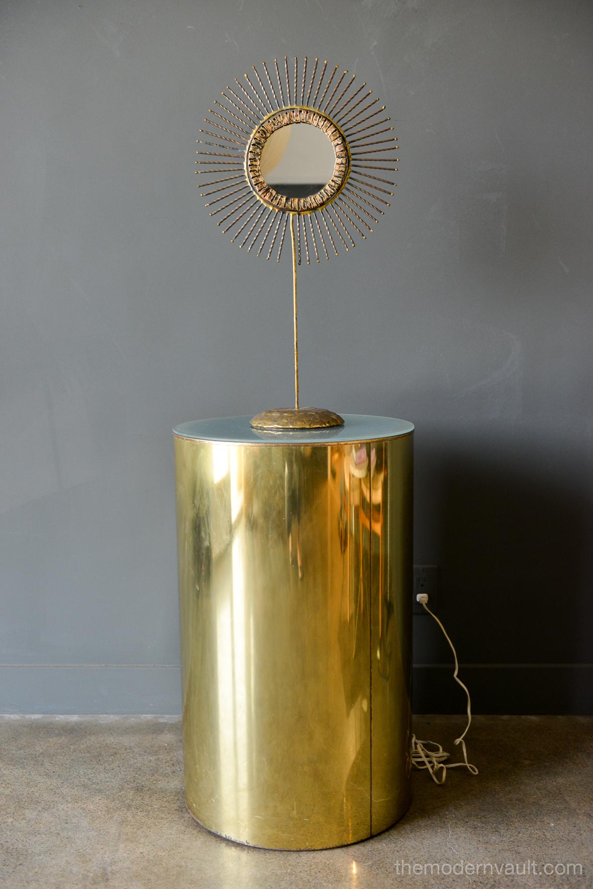 Illuminated brass pedestal stand by Curtis Jere for Artisan House, circa 1980. Original frosted glass and wiring, signed on base. Unrestored original condition with some patina to base and wear as shown.

Measures 29