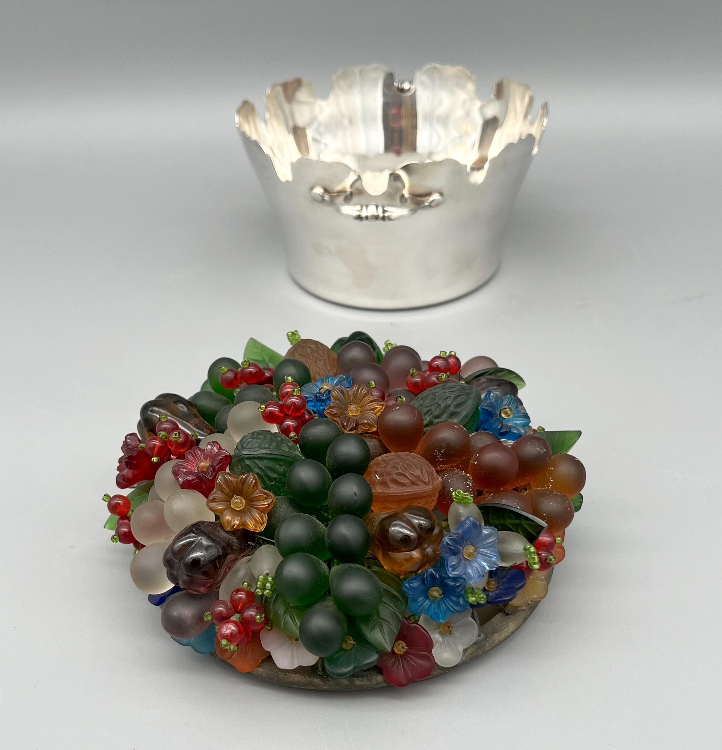 Attractive, luminous silver-plated rafraichissoir decorated with flowers and fruit in colored glass. A light bulb is concealed inside.