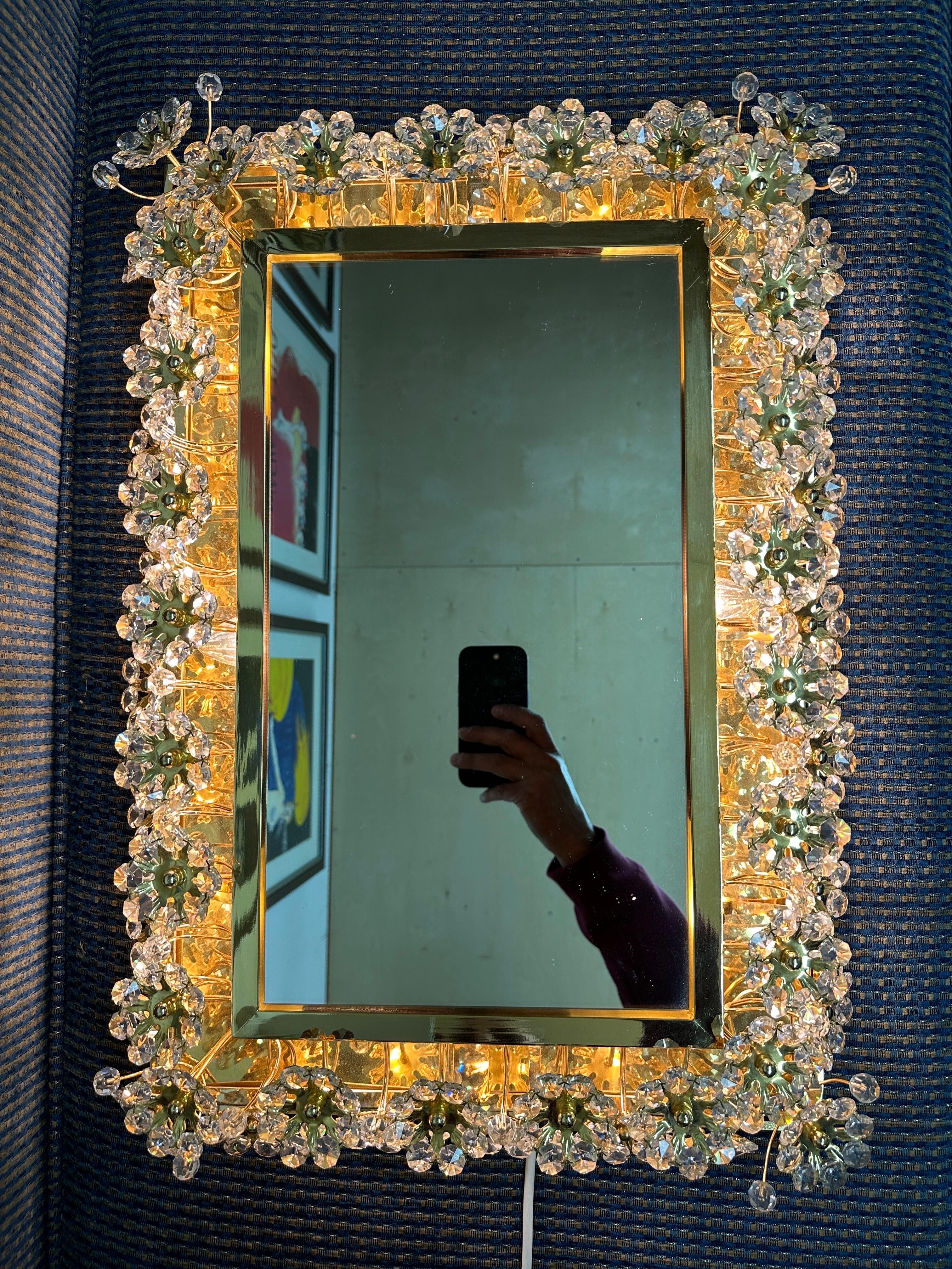 Illuminated rectangular mirror with crystal flowers by Palwa. Requires six E14 base bulbs.