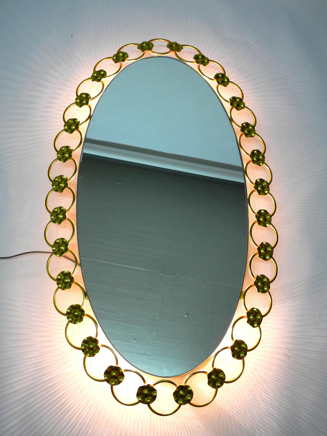 Mid-Century Modern Illuminated Oval 1960s Large Wall Mirror with a Brass Frame For Sale