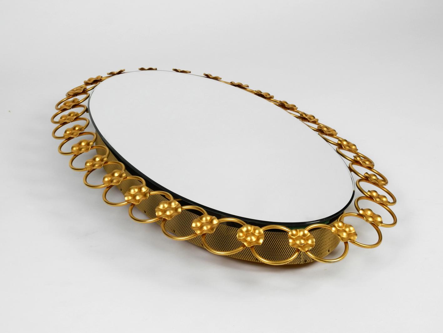 Illuminated Oval 1960s Large Wall Mirror with a Brass Frame In Good Condition For Sale In München, DE