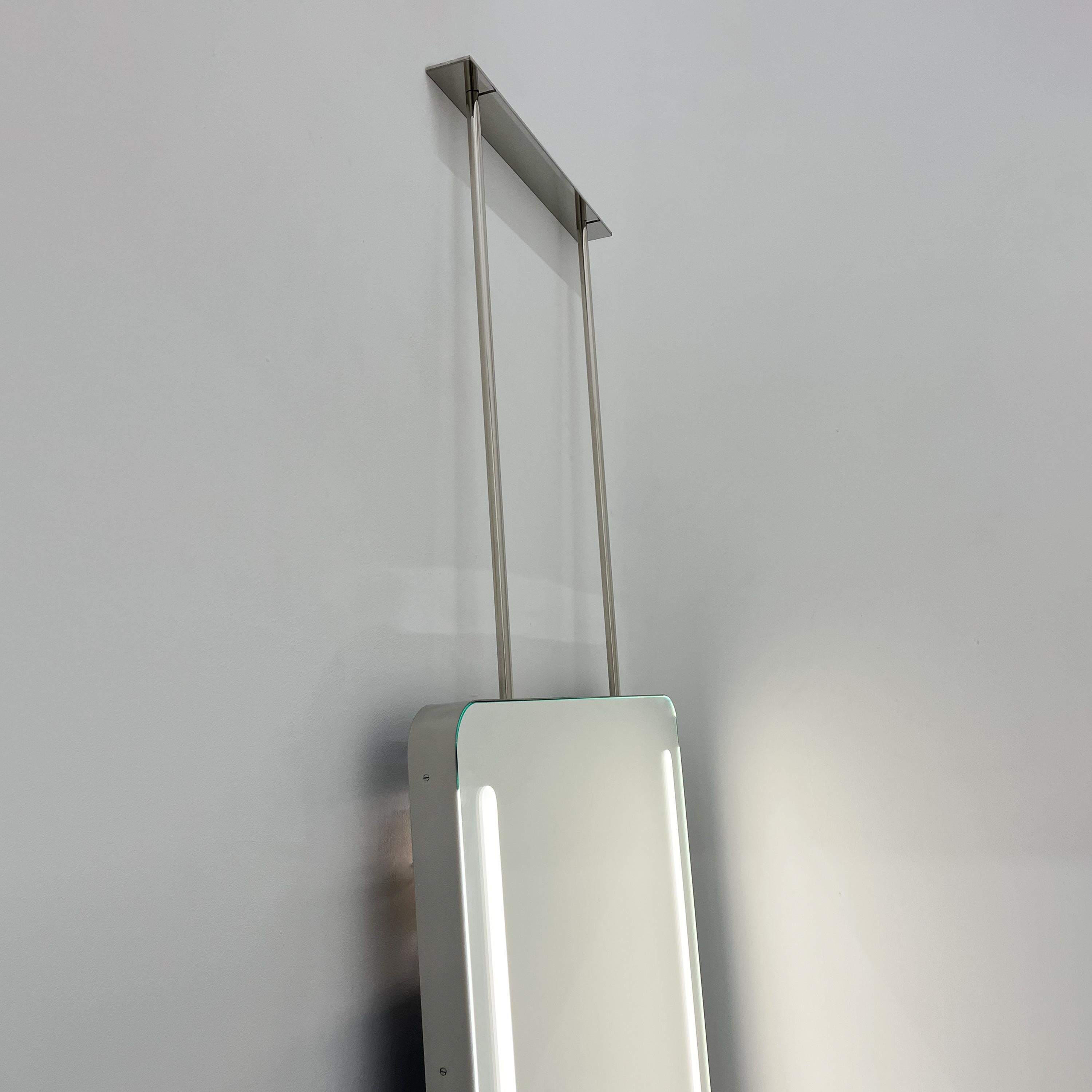 mirror suspended from ceiling