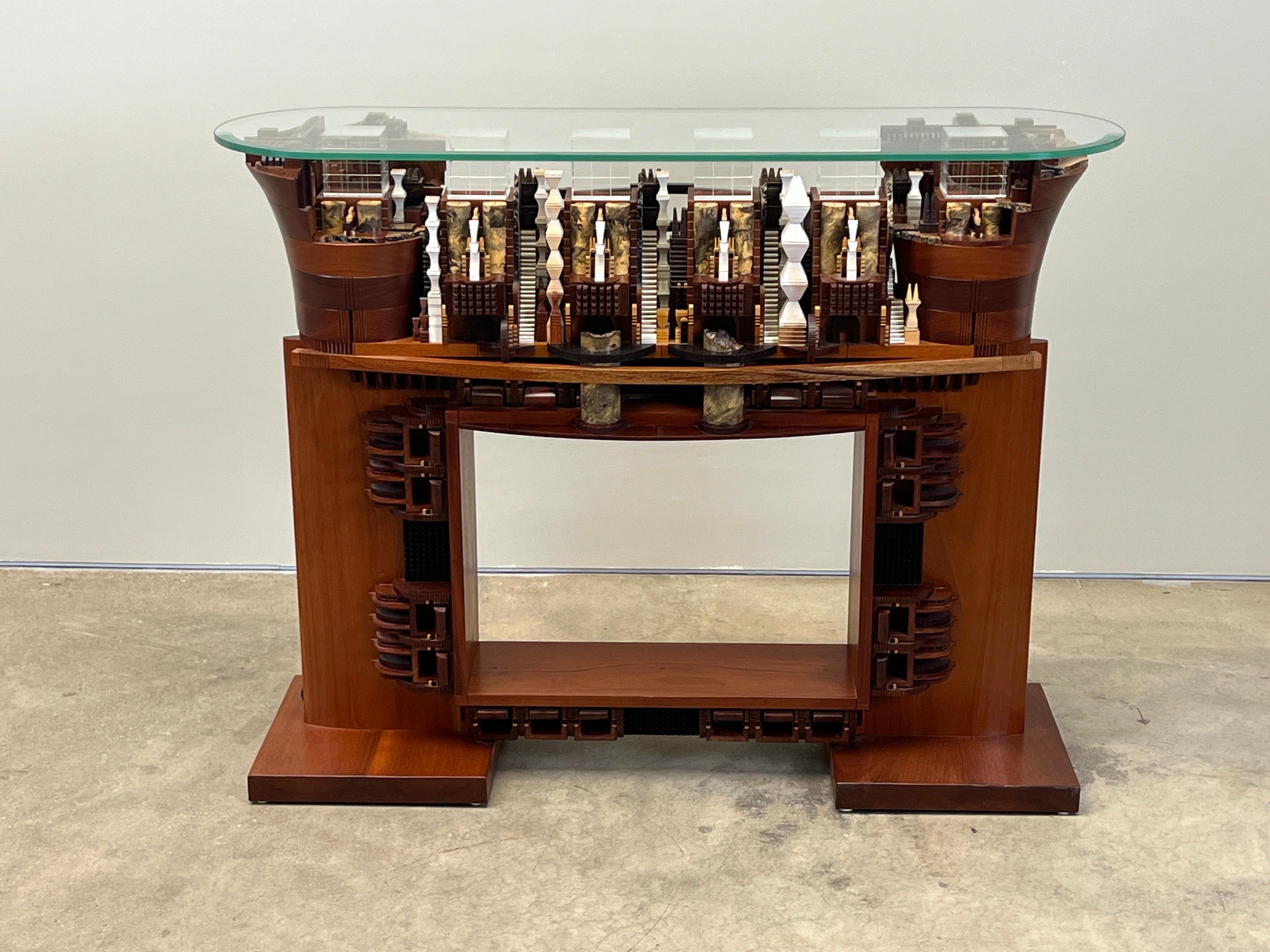 An incredibly intricate and architectural illuminating console table crafted by Po Shun Leong. This masterful work has illuminating glass cubes  by Latchezar Boyadjiev. 