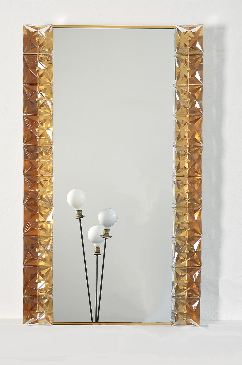 Illuminating wall mirror in crystal glass and gilt brass from Kinkeldey, 1970s.