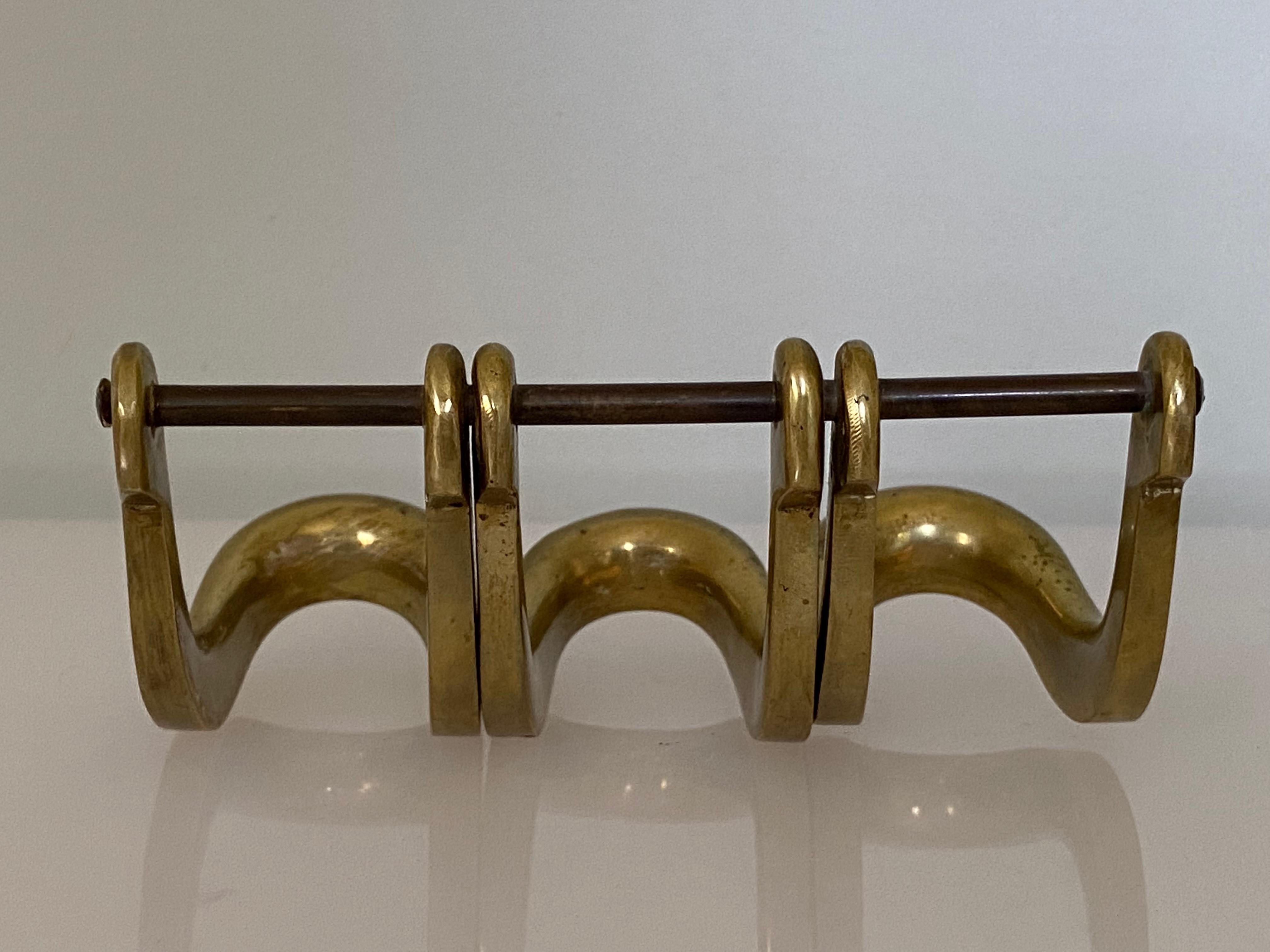 Pipe stand attributed to Carl Auböck. Produced by Illum Bolighus in Denmark.