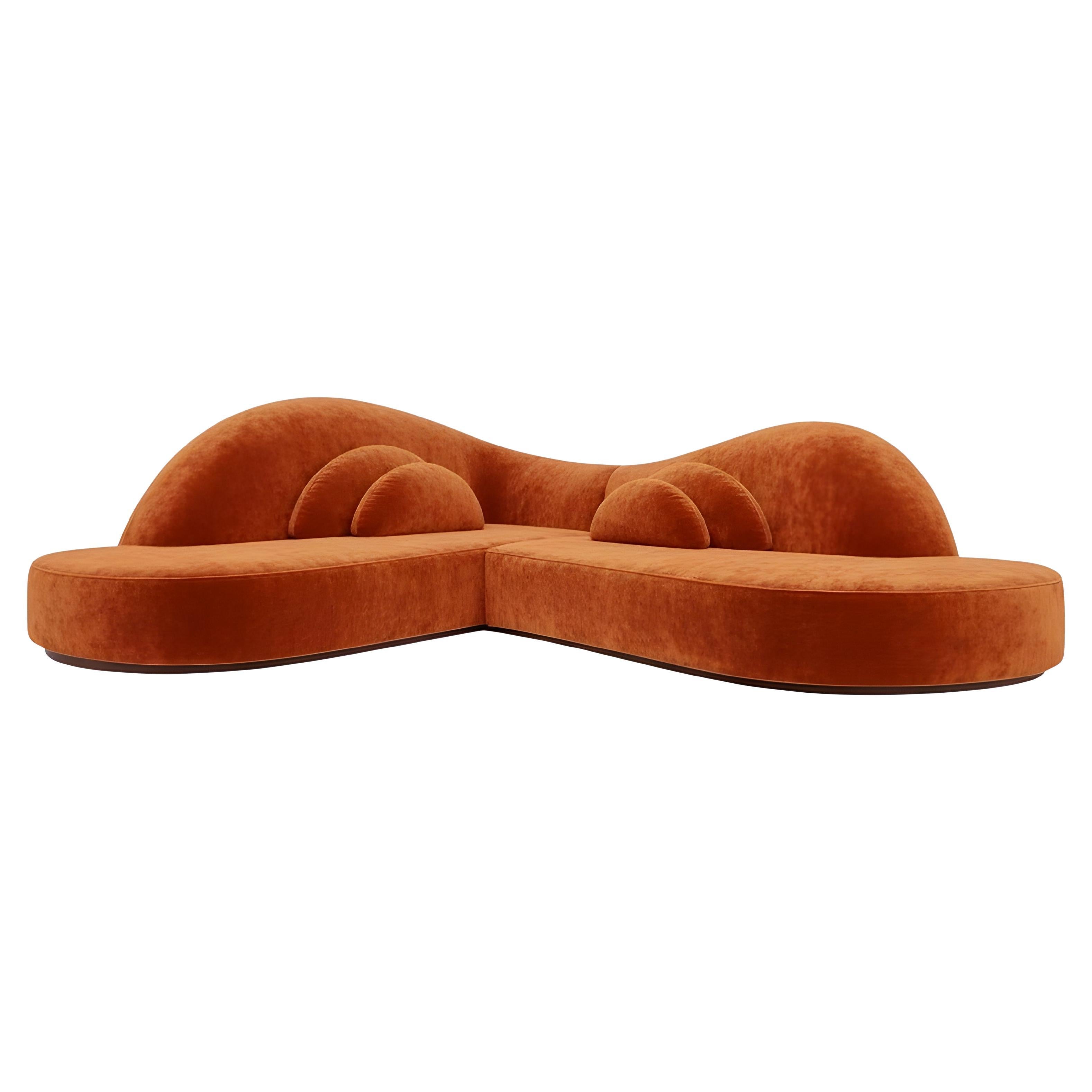 Divano Illusion ad angolo a 90 gradi con Silhouette curva in velluto arancione bruciato
