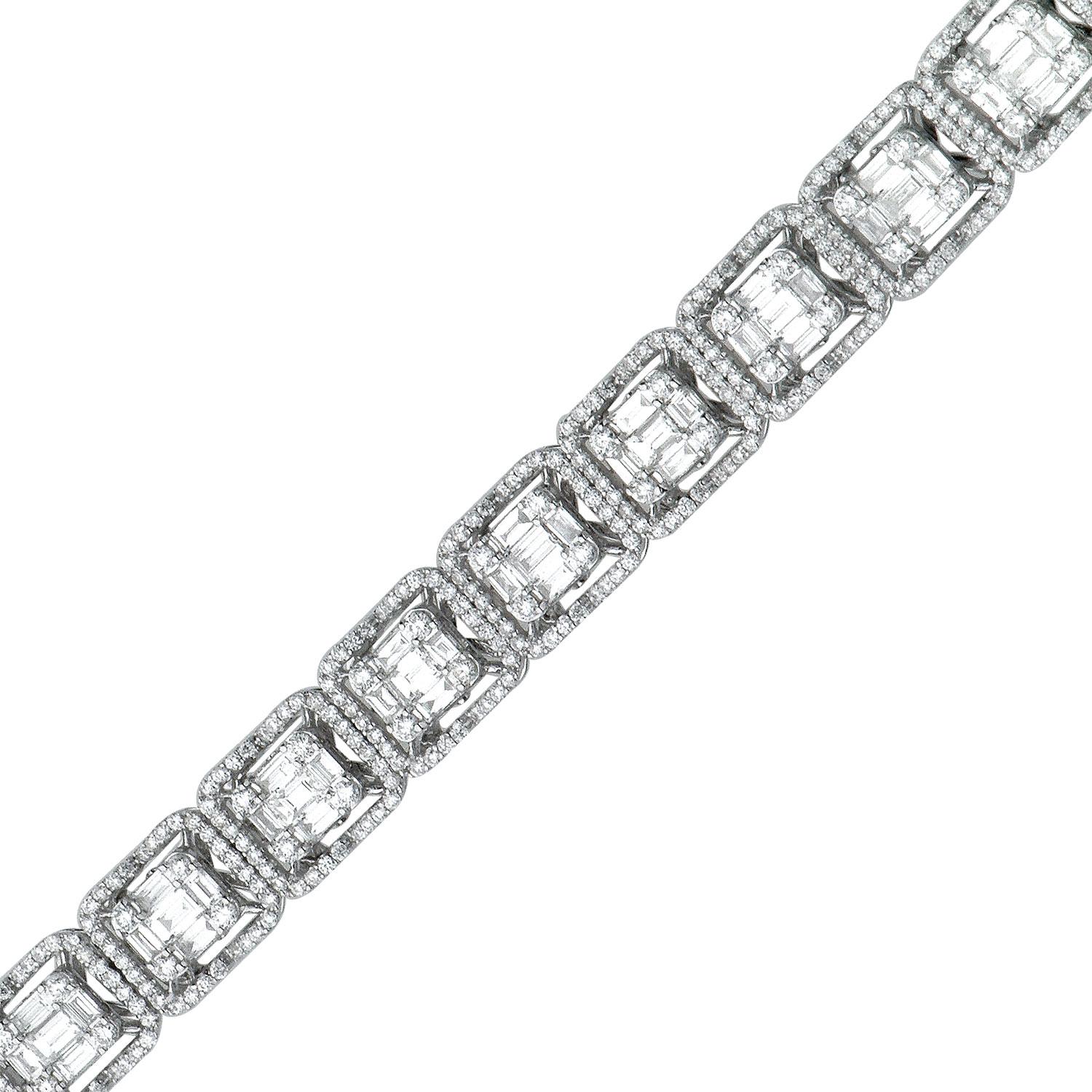 This stunning bracelet is sure to turn heads and be cherished. It contains 612 round diamonds totaling 2.94 carats, and 90 baguette diamonds totaling 4.11 carats, which are VS2 quality and G color. These diamonds expertly put together create the