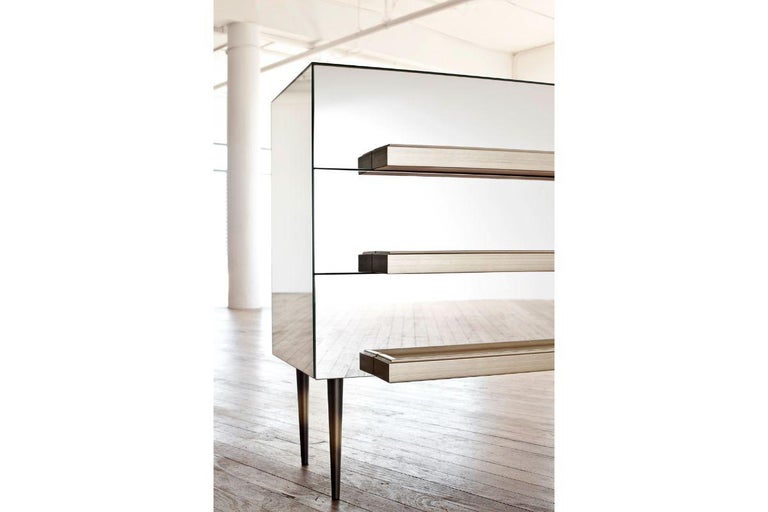 Illusion Credenza by Luis Pons
Dimensions: W 119 x D 53 x H 76 cm
Materials: Glass, metal, wood, bronzed, hand-crafted, painted

Also available in different colors

The traditional French mirror cabinet is reinterpreted leaving the mirrors