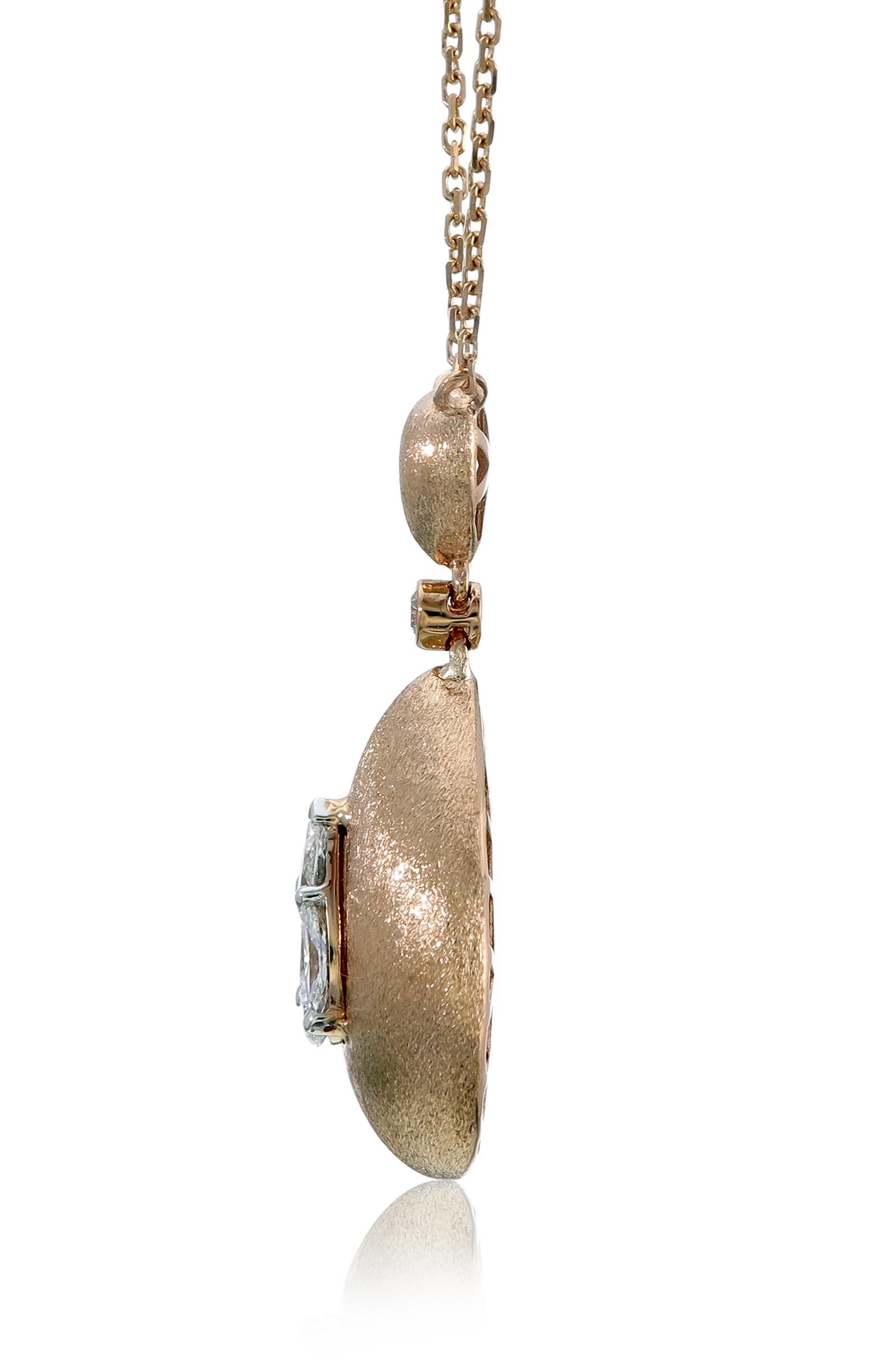 This 18K Rose Gold cocktail Pendant Necklace features a luscious Pear shape White Diamond appx. 1.25cts Illusion. Each diamond hand-selected by our experts for its superior luster and surface quality. Combine with glamorous outfits for a
