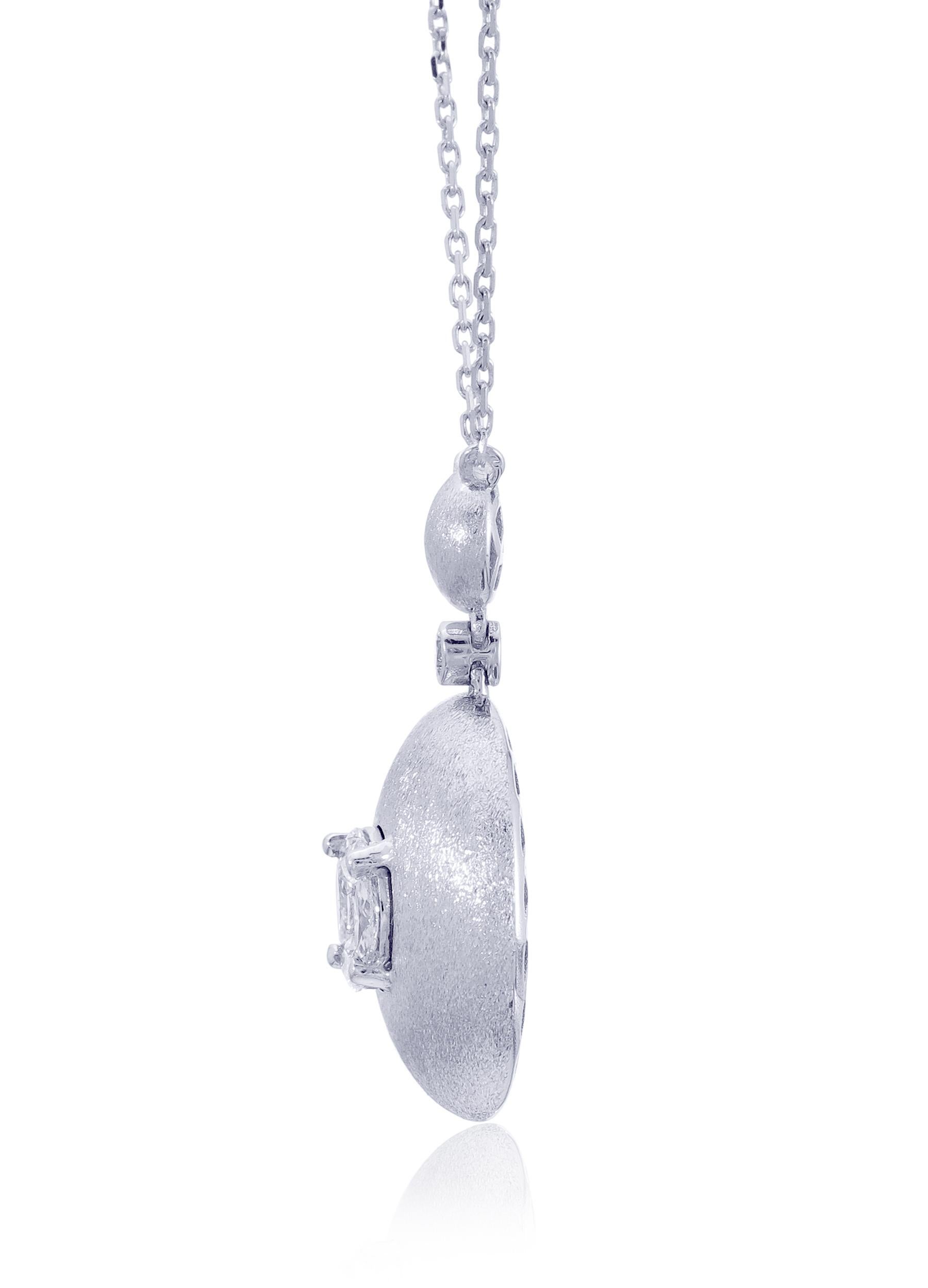 This 18K White Gold cocktail Pendant Necklace features a luscious Round shape White Diamond appx. 1.25cts Illusion. Each diamond hand-selected by our experts for its superior luster and surface quality. Combine with glamorous outfits for a