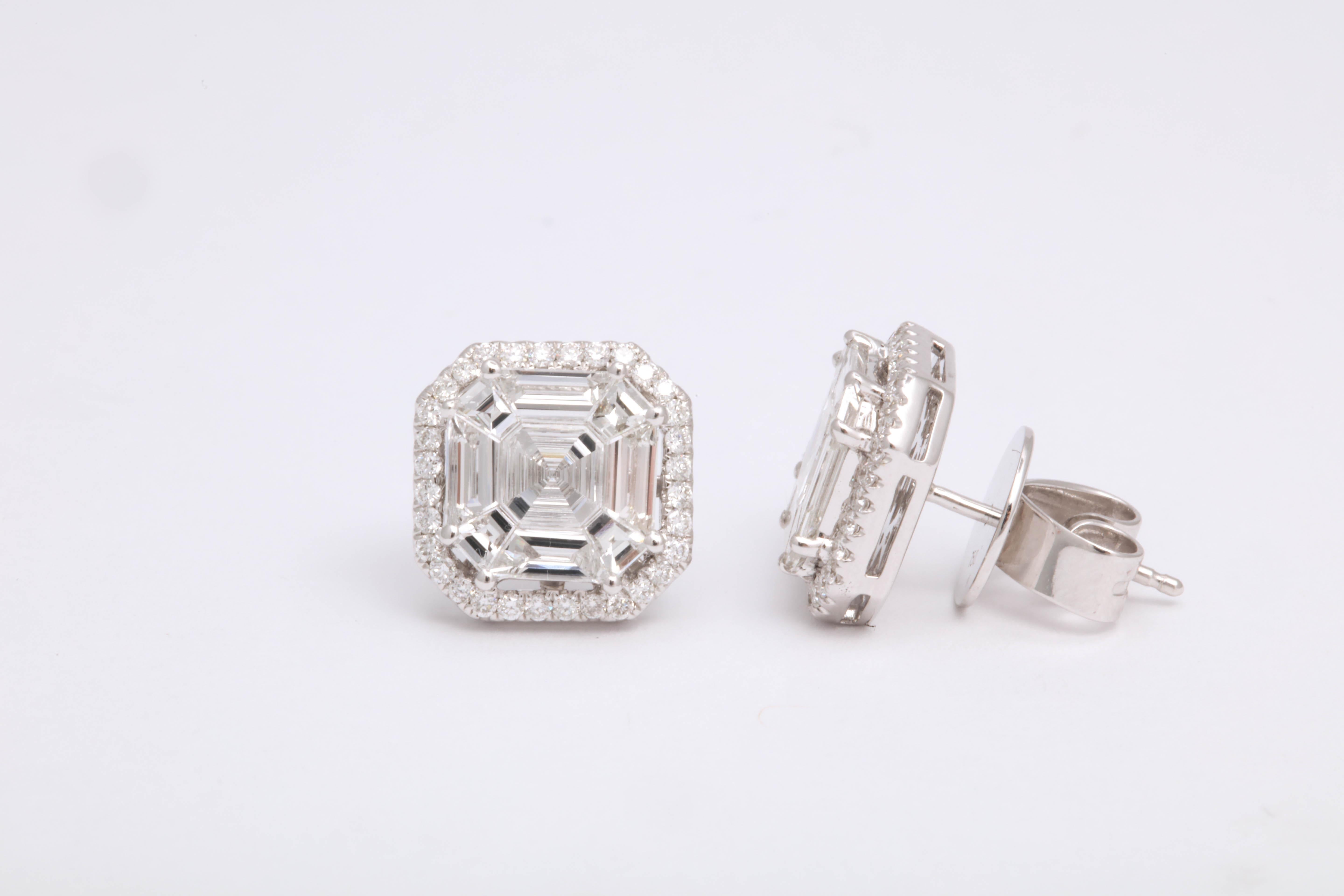 
An INCREDIBLE pair of diamond stud earrings!!

Multiple special cut diamonds set in an asscher shape -- looks like a pair of 4 carat EACH Asscher cut stud earrings!!

3.27 carats of diamonds set in 18k white gold 

11.5 mm in diameter 

A fabulous
