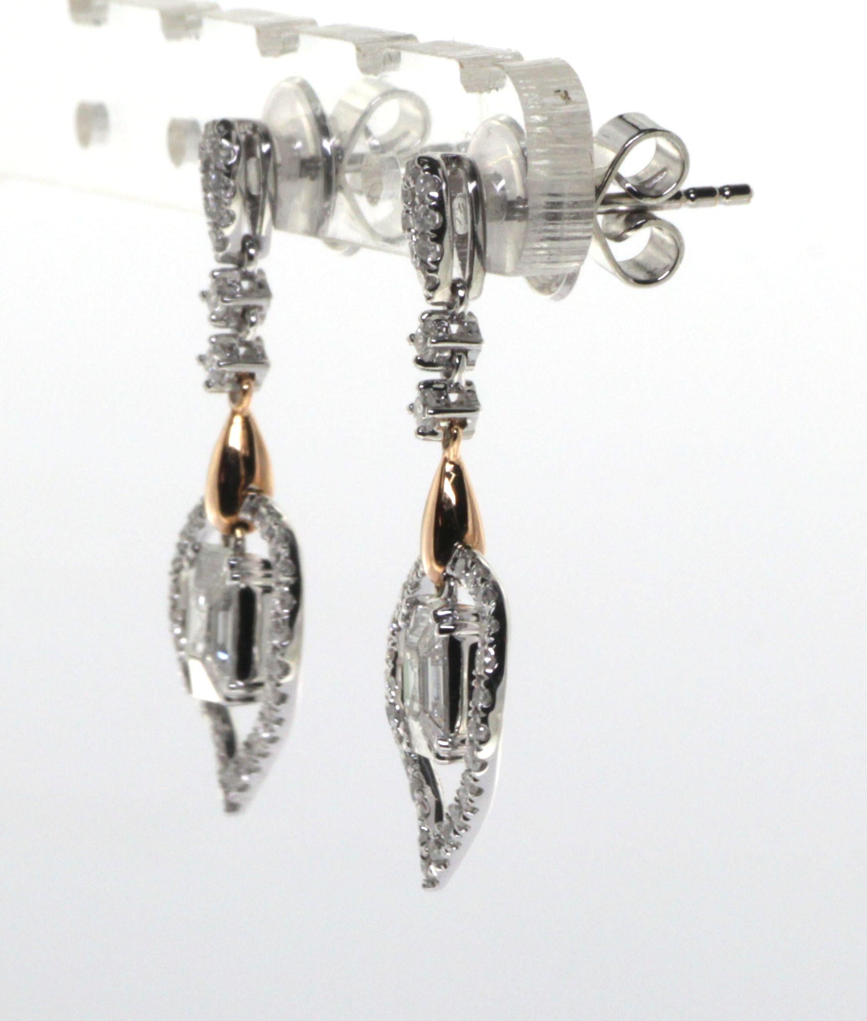 Ti presentiamo un gioiello davvero squisito che ti lascerà a bocca aperta: gli orecchini Illusion Setting Diamond in oro rosa e bianco 18 carati. Questo splendido orecchino presenta una torta di diamanti da 0,61 carati al centro, incastonata in una