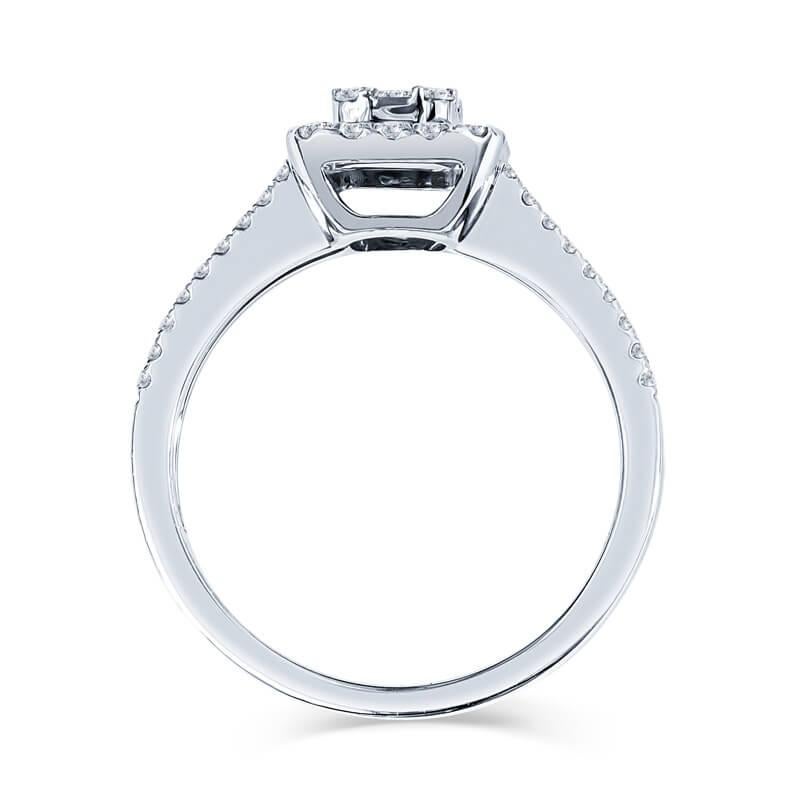Verlobungsring für eine Dame aus 18kt Weißgold mit 0,67 Karat Diamanten. Dieser Ring hat einen doppelten Schaft aus Diamanten, der am oberen Ende des Rings auf den Heiligenschein trifft. Der Mittelstein im Illusionsstil besteht aus Diamanten im