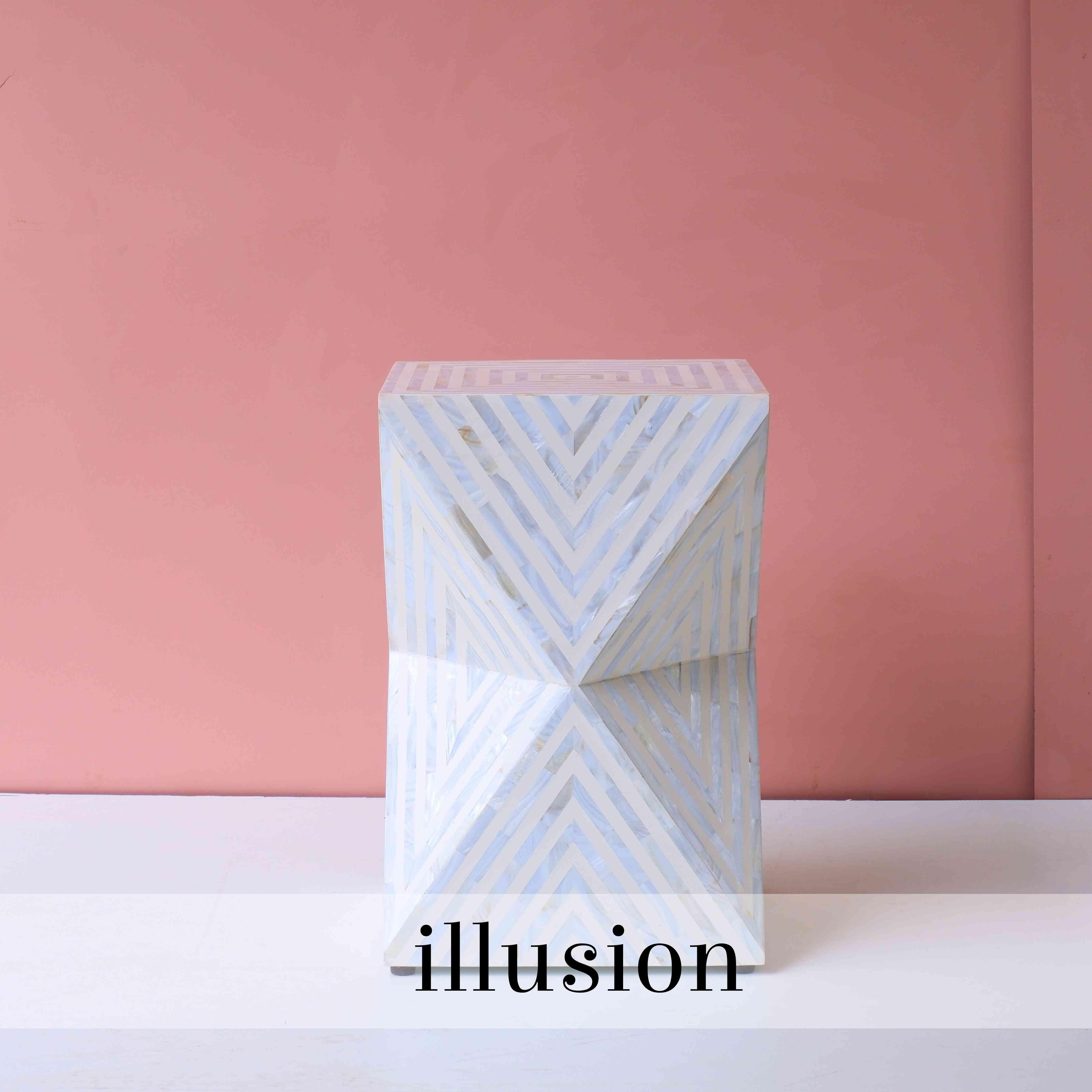 The combination of mother of pearl inlay and illusion effects creates a mesmerizing and luxurious aesthetic. Mother of pearl's iridescent quality adds a touch of opulence and elegance to the table, while the illusion effect enhances its visual