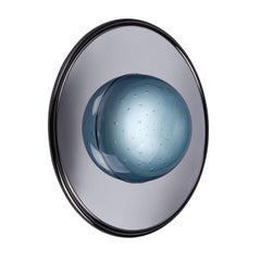 Illusione – Kleine hellblaue Wandleuchte aus Glas