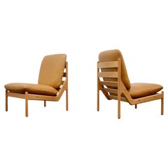 Illum Wikkelsø Pair of Lounge Chairs in Leather and Oak Denmark 60s
