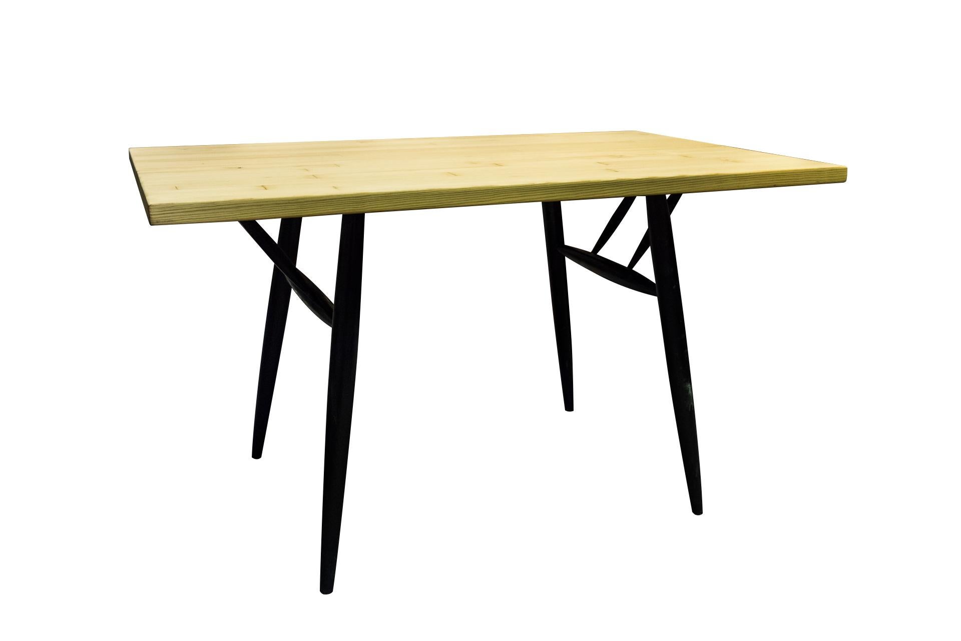 Ilmari Tapiovaara (1914-1999), 
Pirkka dining room table,
Natural wood tabletop, lacquered wood feet,
Finland, circa 1960

Measures: Width 120 cm, height 70 cm, depth 73 cm.