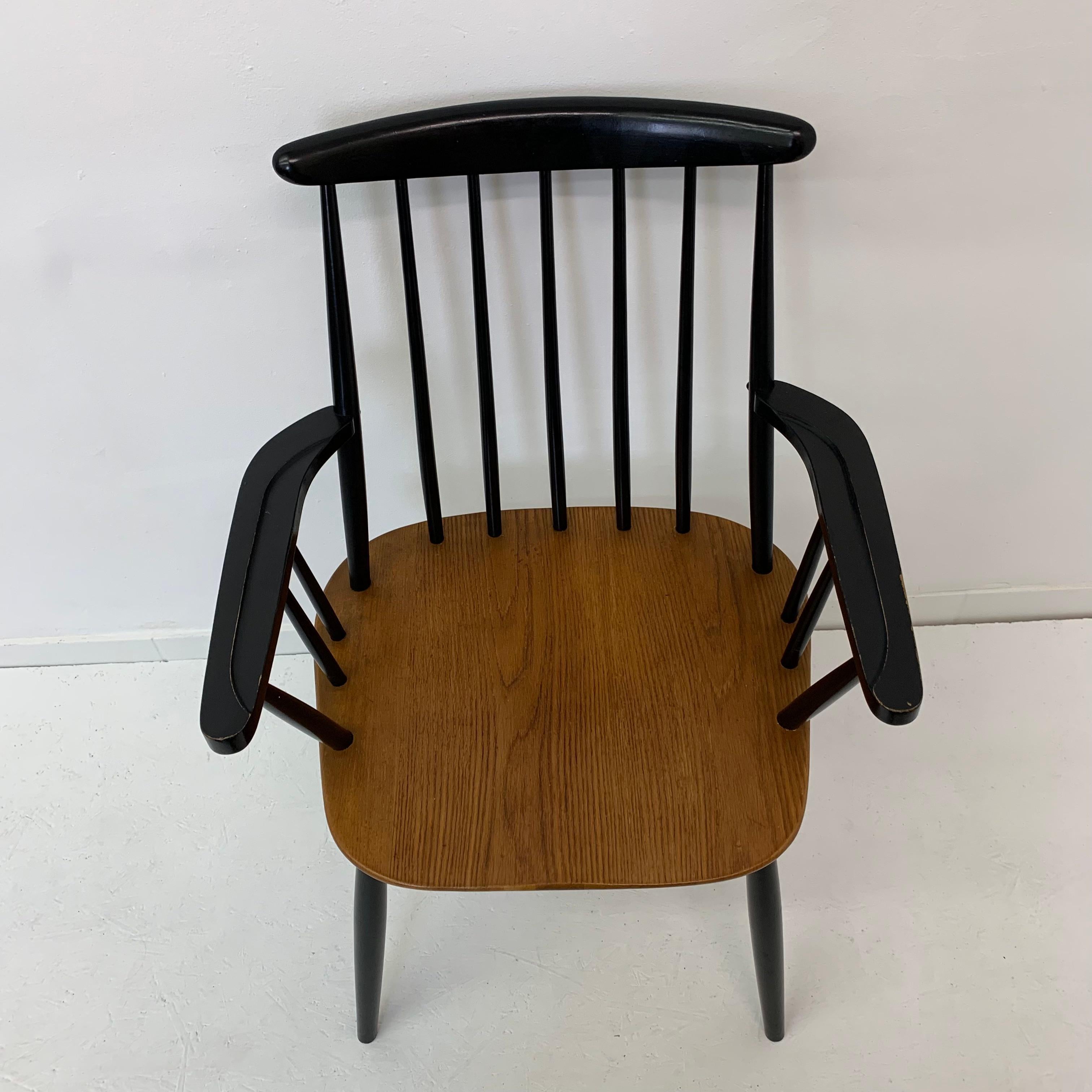 Wood Ilmari Tapiovaara chair with armrest , 1960’s For Sale