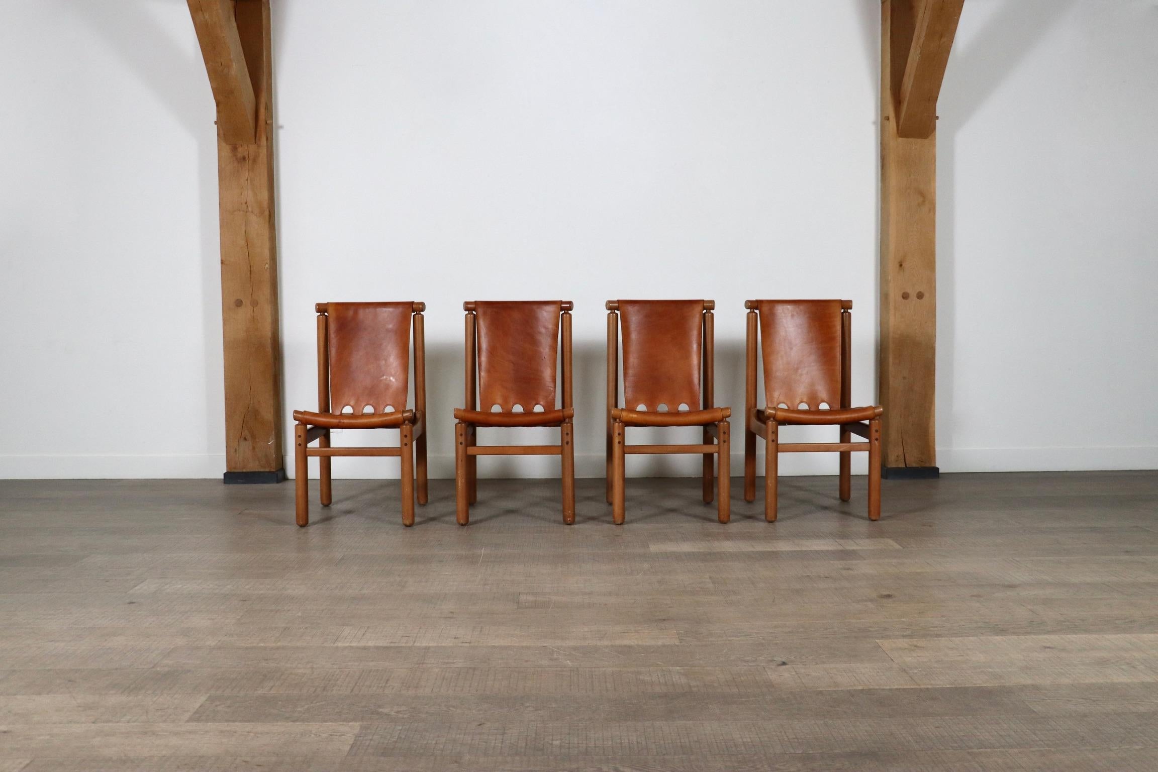 Ilmari Tapiovaara for La Permanente Mobili Cantù in cognac leather, Italy, 1960s

These beautiful chairs by Ilmari Tapiovaara feature a nice beech frame which is designed without any screws and with a curved seating and backrest slat for additional