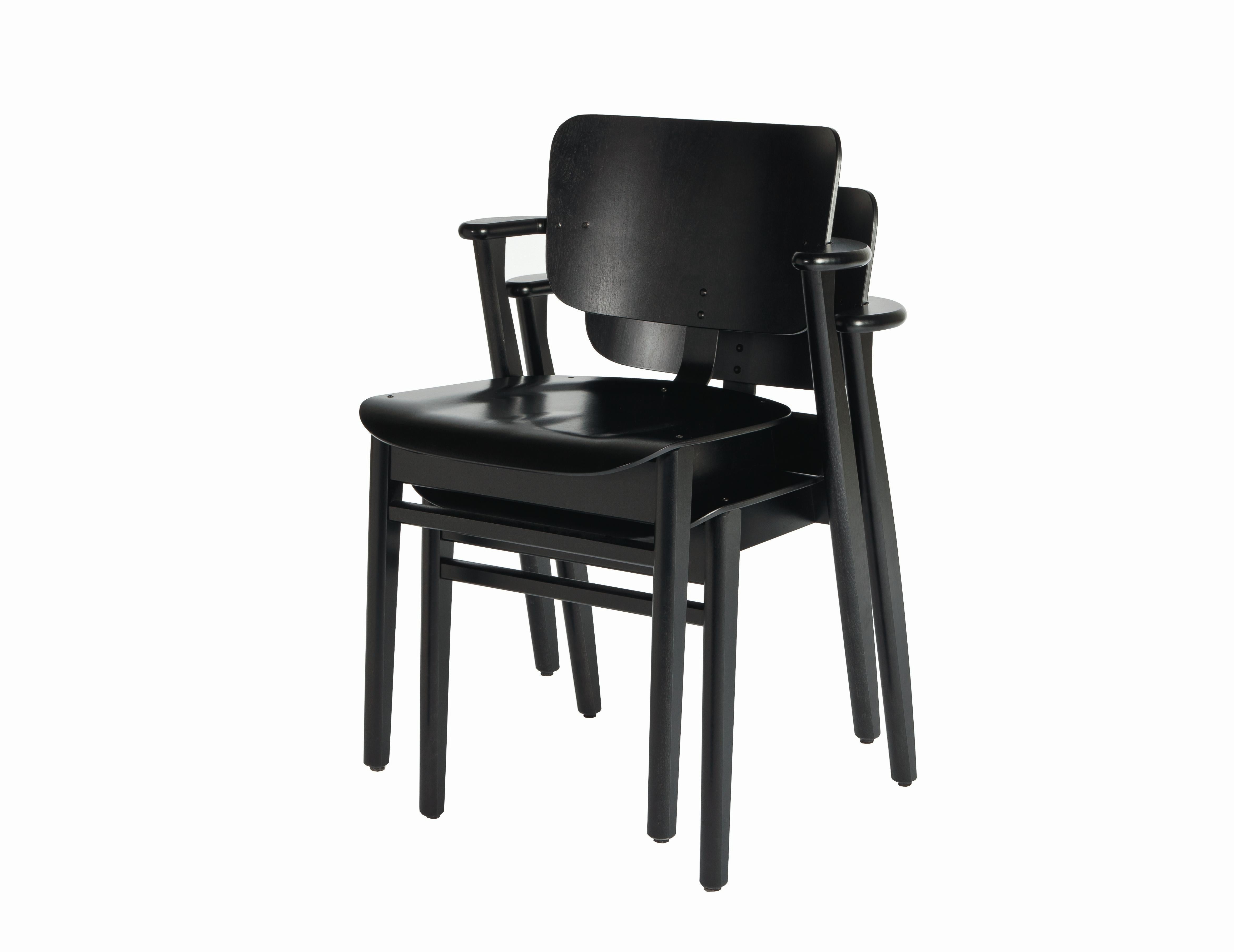 Ilmari Tapiovaara Domus chair in black birch and leather for Artek. Designed in 1946 and produced by Artek of Finland. Executed in black stained birchwood and black prestige leather on seat and back. Stackable up to four chairs. 

Price is per item.
