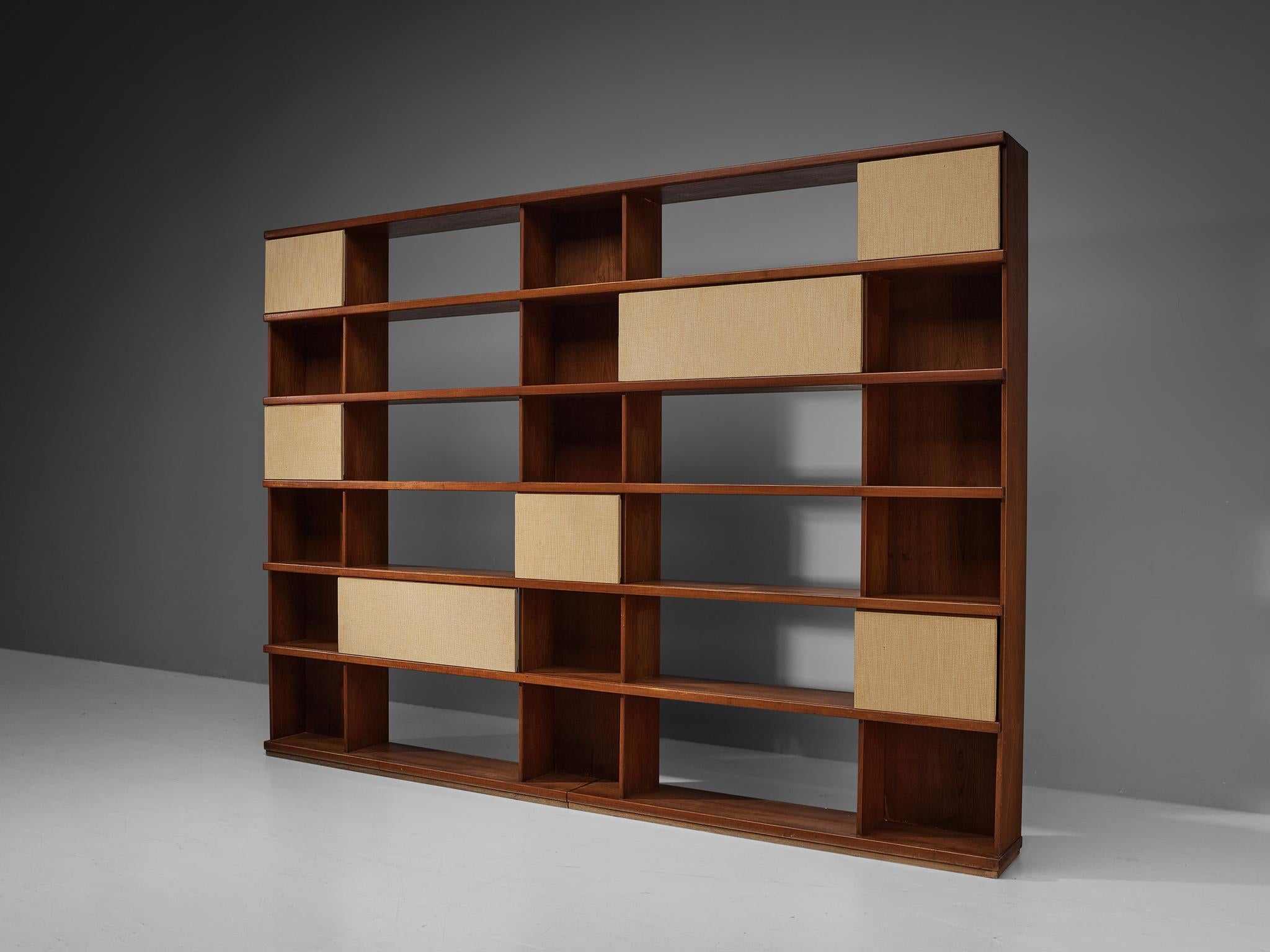 IImari Tapiovaara for La Permanente Mobili Cantù, bookcase, teak, fabric, Italy, circa 1957

This grand bookcase executed in teak is designed by the Finnish designer Ilmari Tapiovaara. The clean lines allow you to showcase your special belongings in
