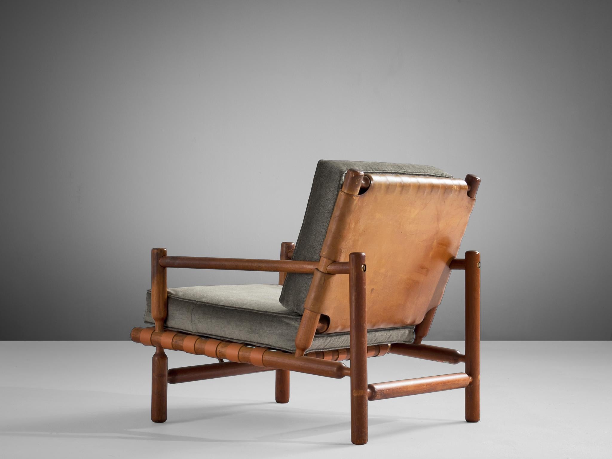 Ilmari Tapiovaara, lounge chair, teak, fabric, leather, Italy, 1957.

Rare lounge chair designed by Ilmari Tapiovaara, made of beautiful supple leather accompanying a solid teak frame. The design was produced in 1957 by the artisan workshop