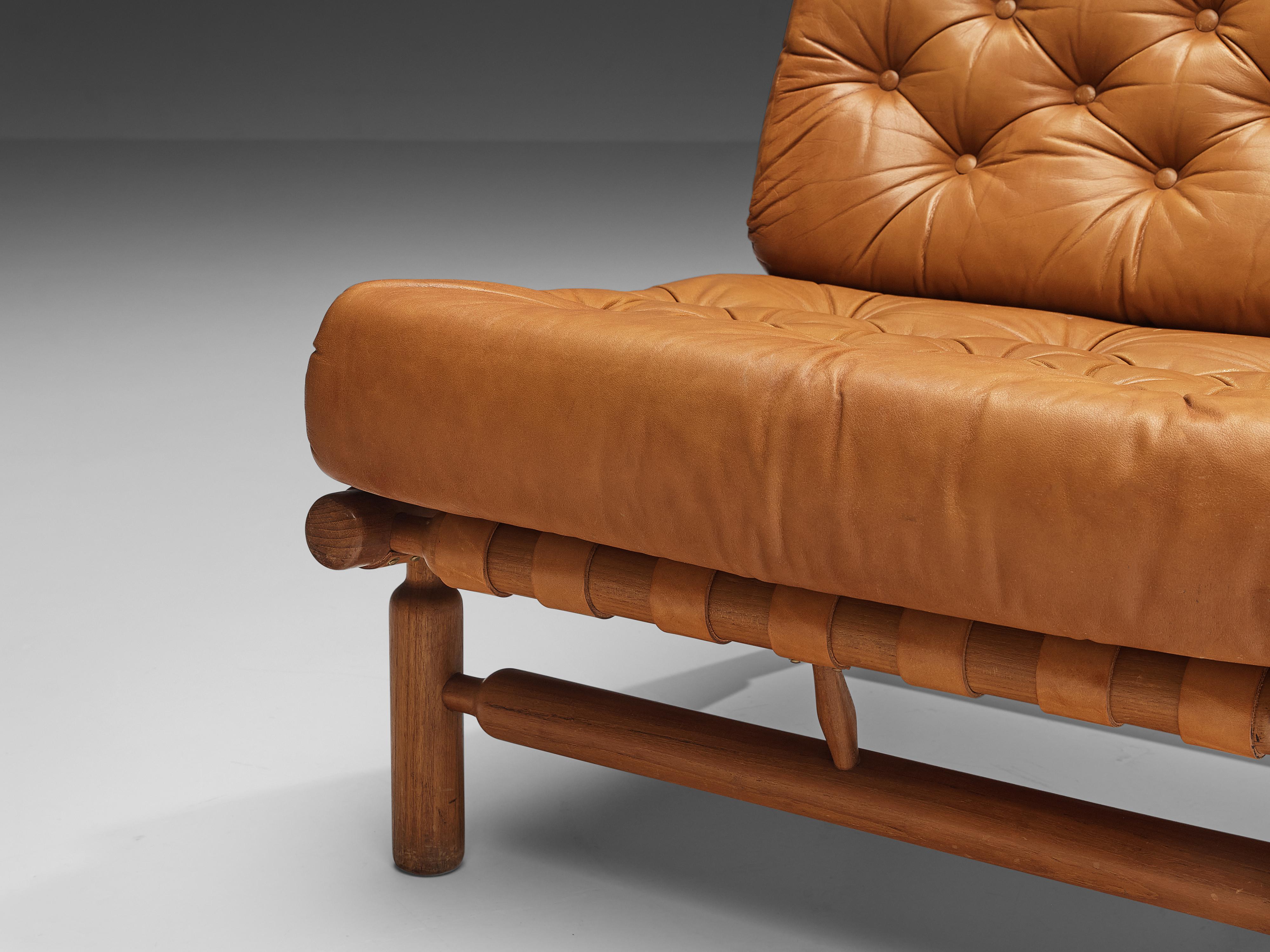 Mid-20th Century Ilmari Tapiovaara Lounge Chair with Ottoman in Cognac Leather